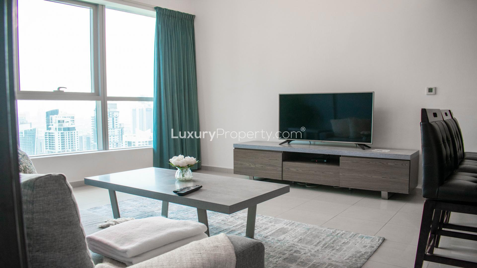 Luxurious living room in 1-bedroom Bay Central apartment, Dubai Marina with city view