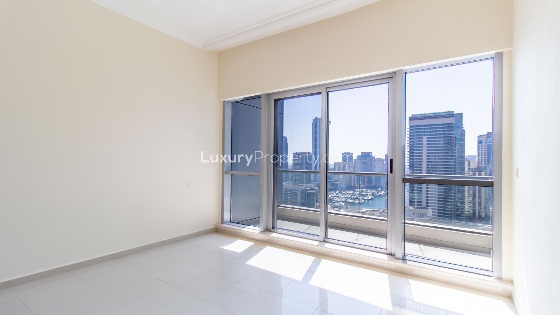 "Stunning view of Dubai Marina skyline from Bay Central apartment for rent.",Elegant 1-bedroom apartment with marina views in Bay Central, Dubai Marina
