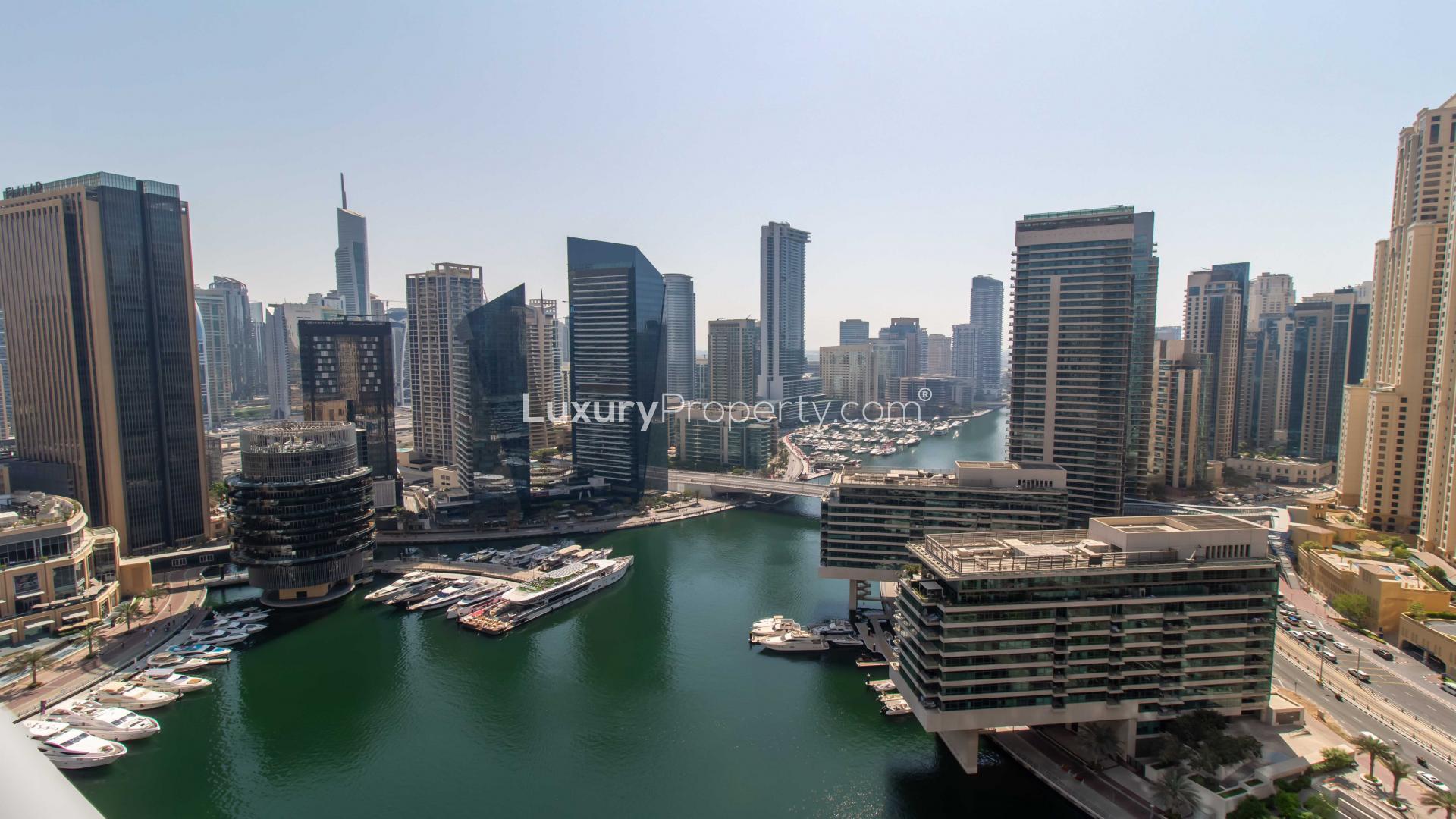 "Stunning view of Dubai Marina skyline from Bay Central apartment for rent."