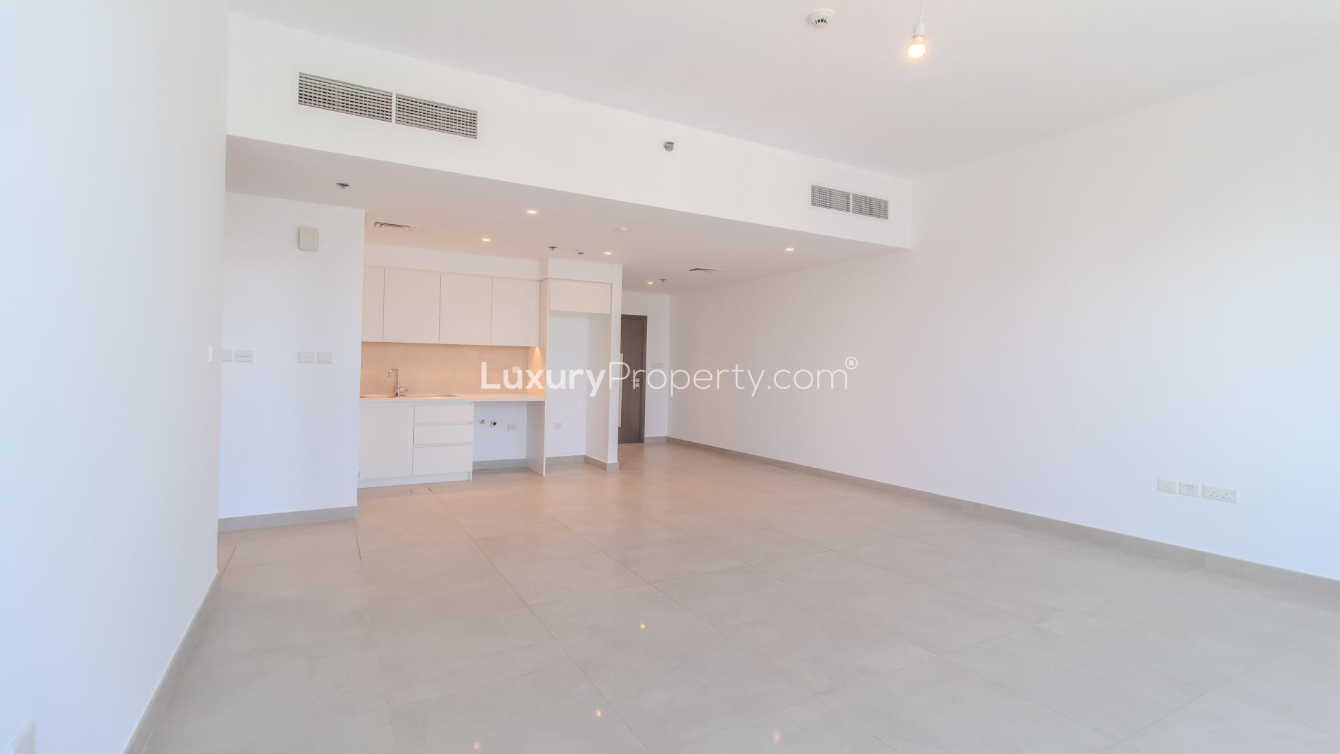 Modern kitchen interior in high-floor Creek Horizon apartment, Dubai Creek Harbour