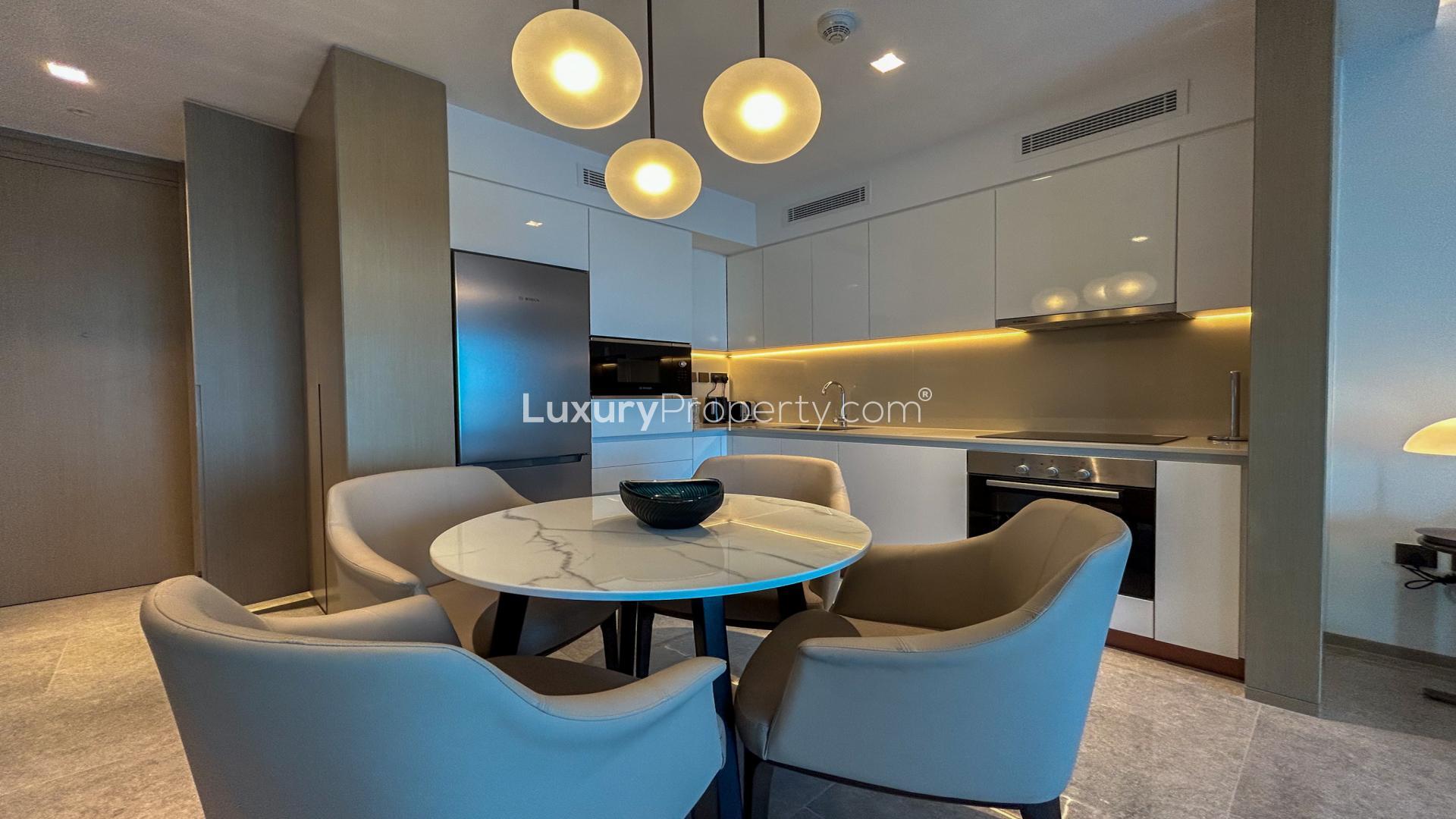 Modern living room with city view in Address Harbour Point apartment, Dubai Creek Harbour