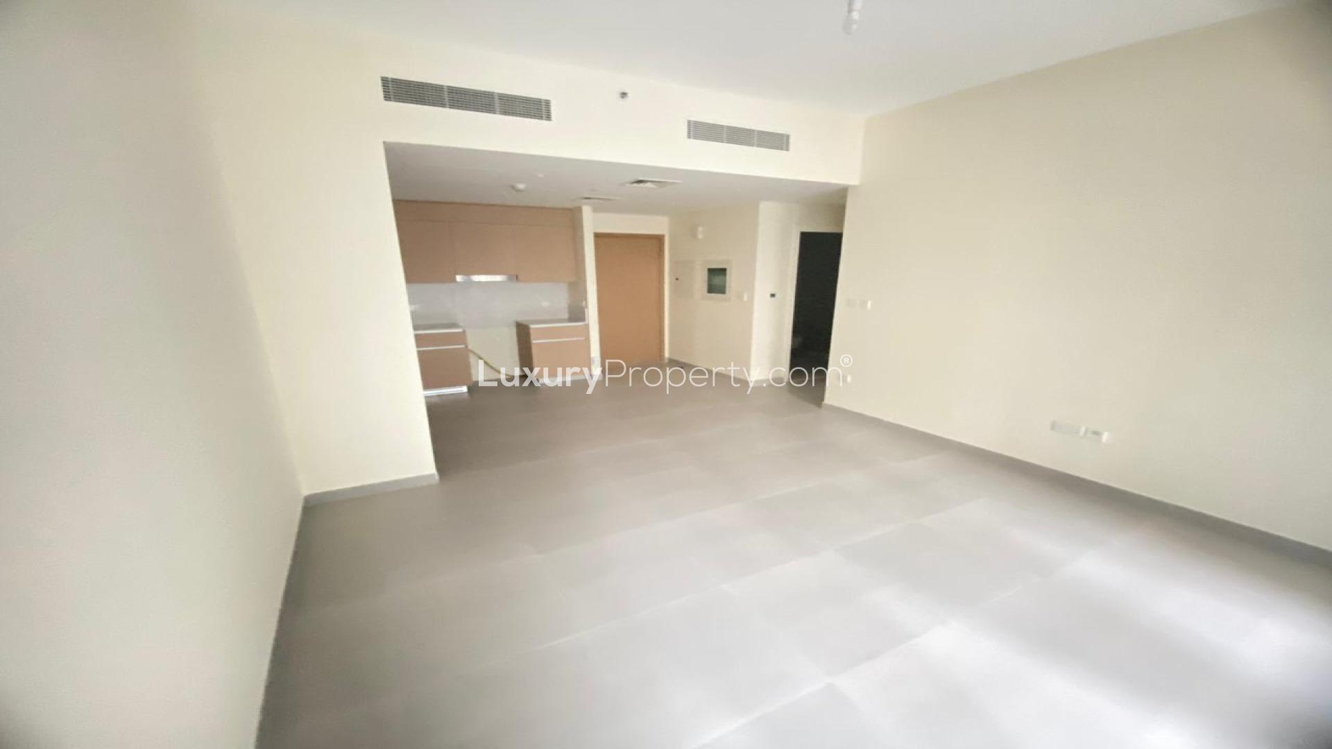 Apartment courtyard view in Lotus at Creek Beach, Dubai Creek Harbour, featuring landscaped greenery