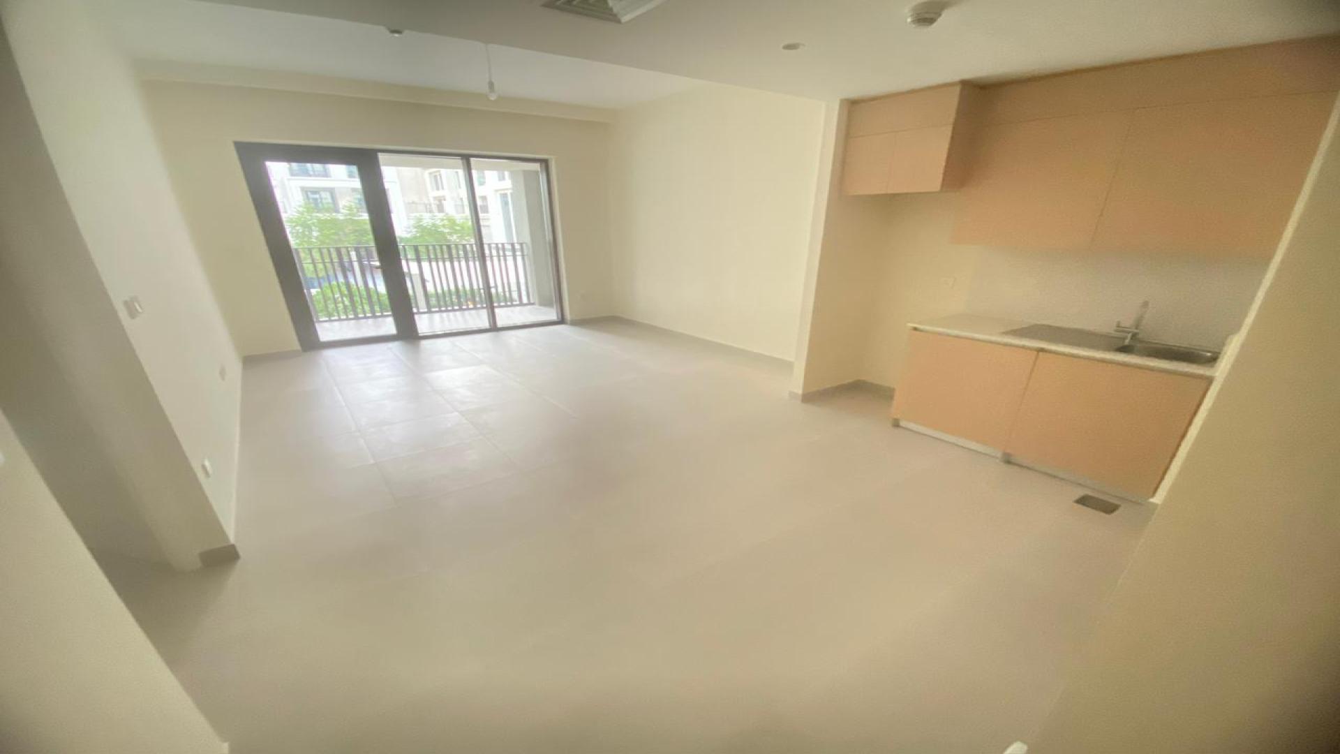 Empty living area in 1-bedroom apartment, Lotus at Creek Beach, Dubai Creek Harbour