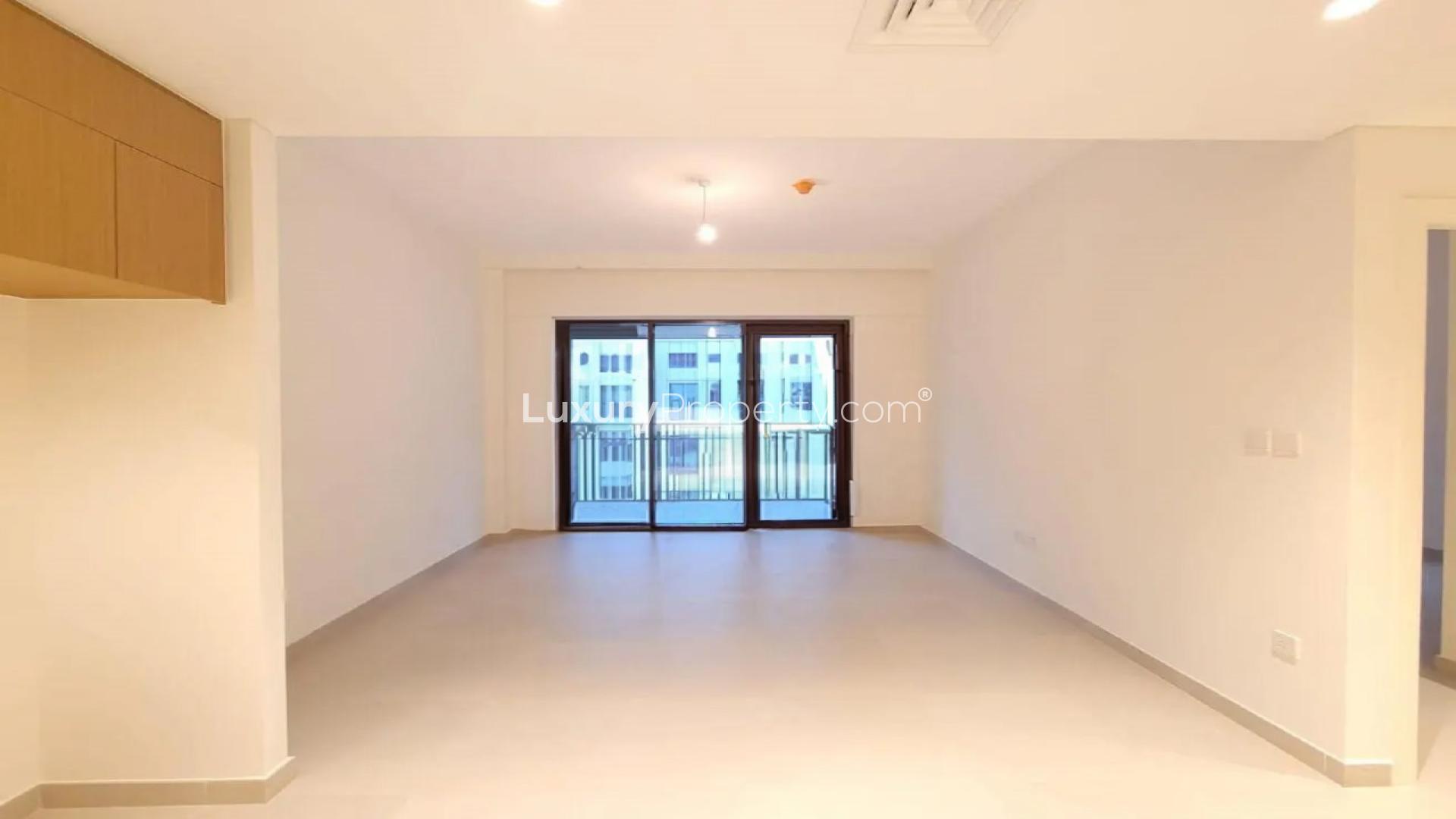 Apartment balcony view at Creek Beach, Dubai Creek Harbour, showing modern residential buildings