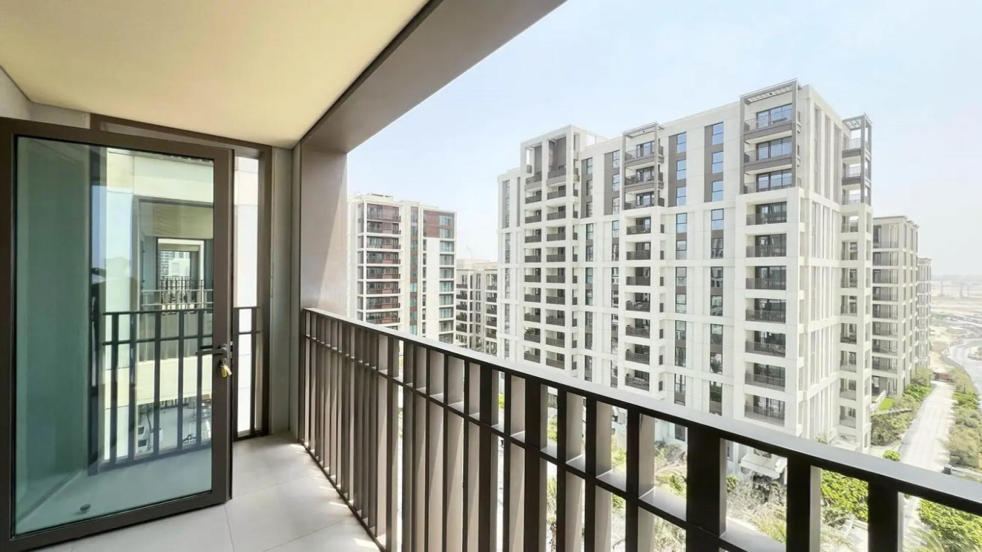 Brand new apartment interior with modern kitchen in Dubai Creek Harbour, ready to move