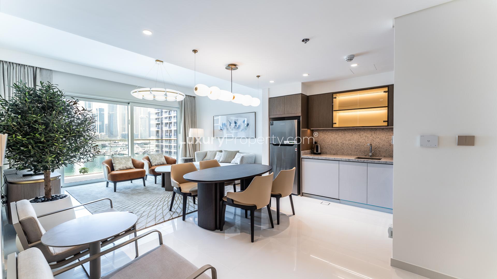 Modern living room and kitchen in Emaar Beachfront apartment