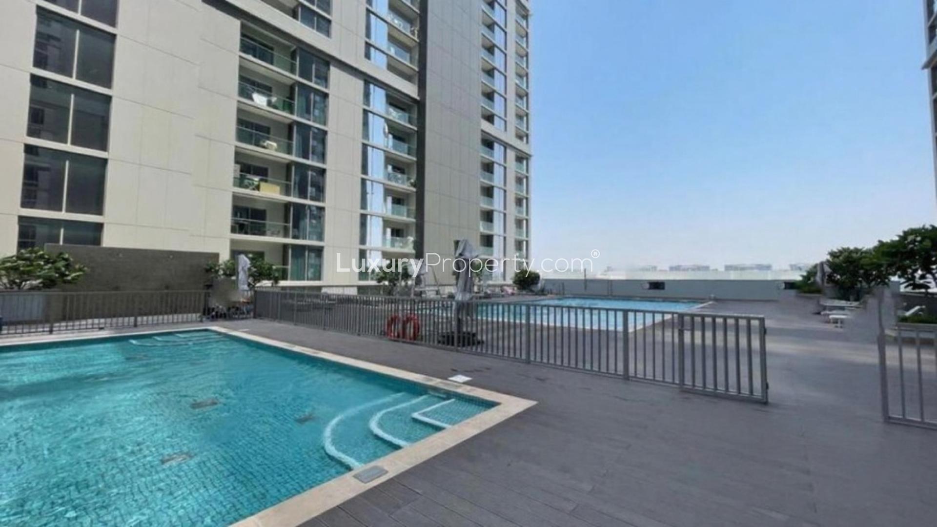 Outdoor pool area at Sobha Creek Vistas Tower B, Sobha Hartland apartment for rent