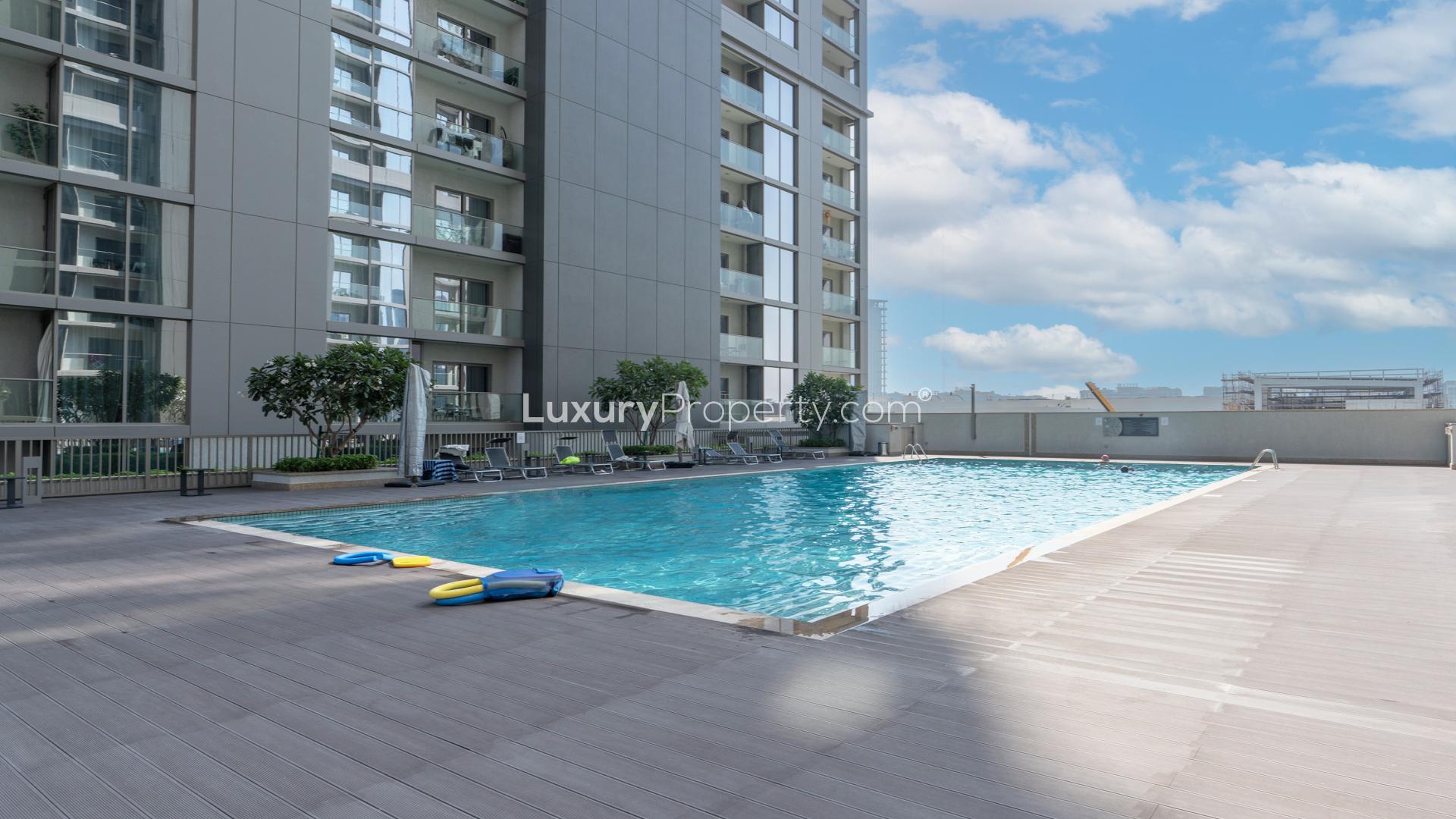 "Spacious balcony view at Sobha Creek Vistas apartment, Mohammed Bin Rashid City, for rent.",Furnished living area in 1-bed apartment, Sobha Creek Vistas, Mohammed Bin Rashid City