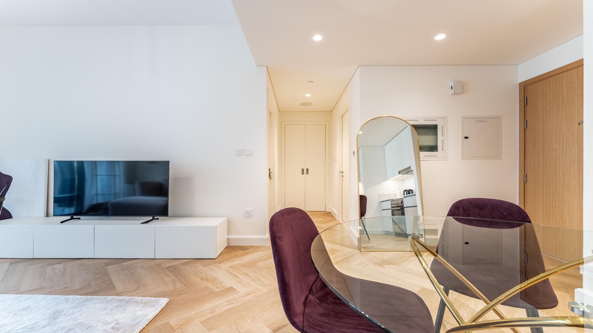 Furnished living and kitchen area in 1-bedroom apartment, Surf Building 1, Dubai Creek Beach