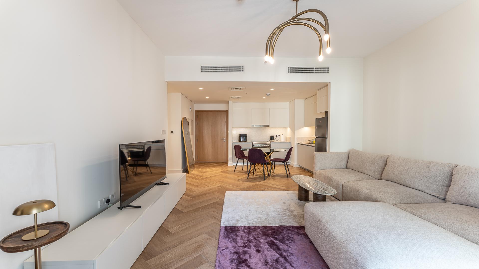 Furnished living area and kitchen in 1-bedroom apartment, Surf Building 1, Dubai Creek Beach