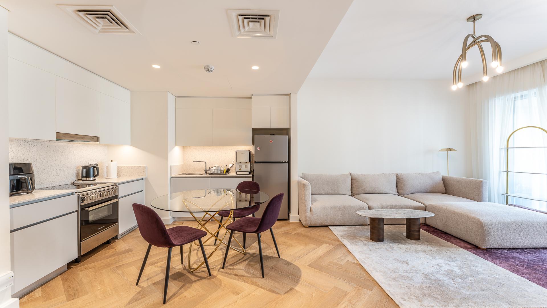 Furnished living room and kitchen in 1-bedroom apartment, Surf Building 1, Dubai Creek Beach