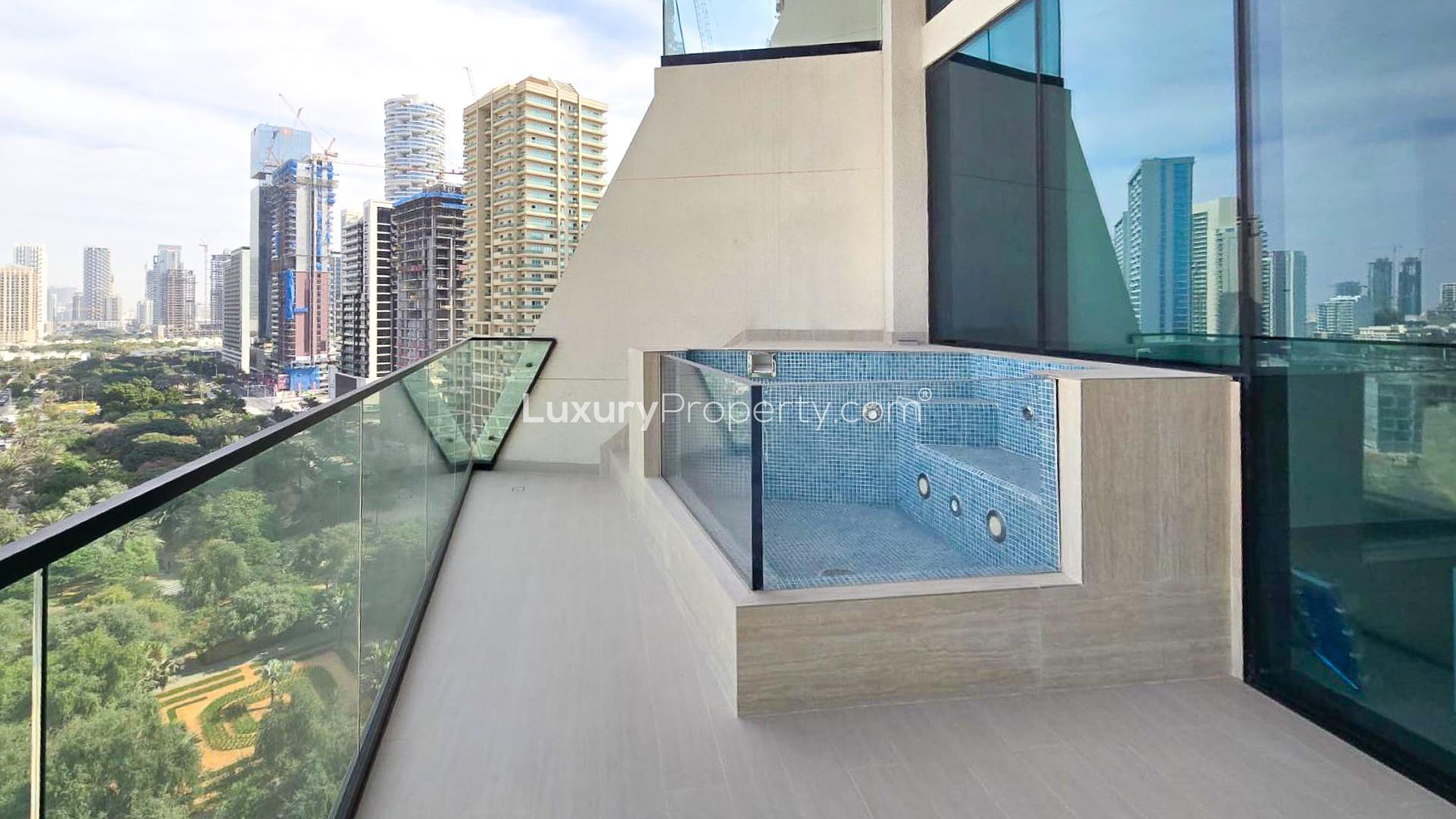 Brand new Binghatti Royale apartment kitchen with modern design and large windows in JVC