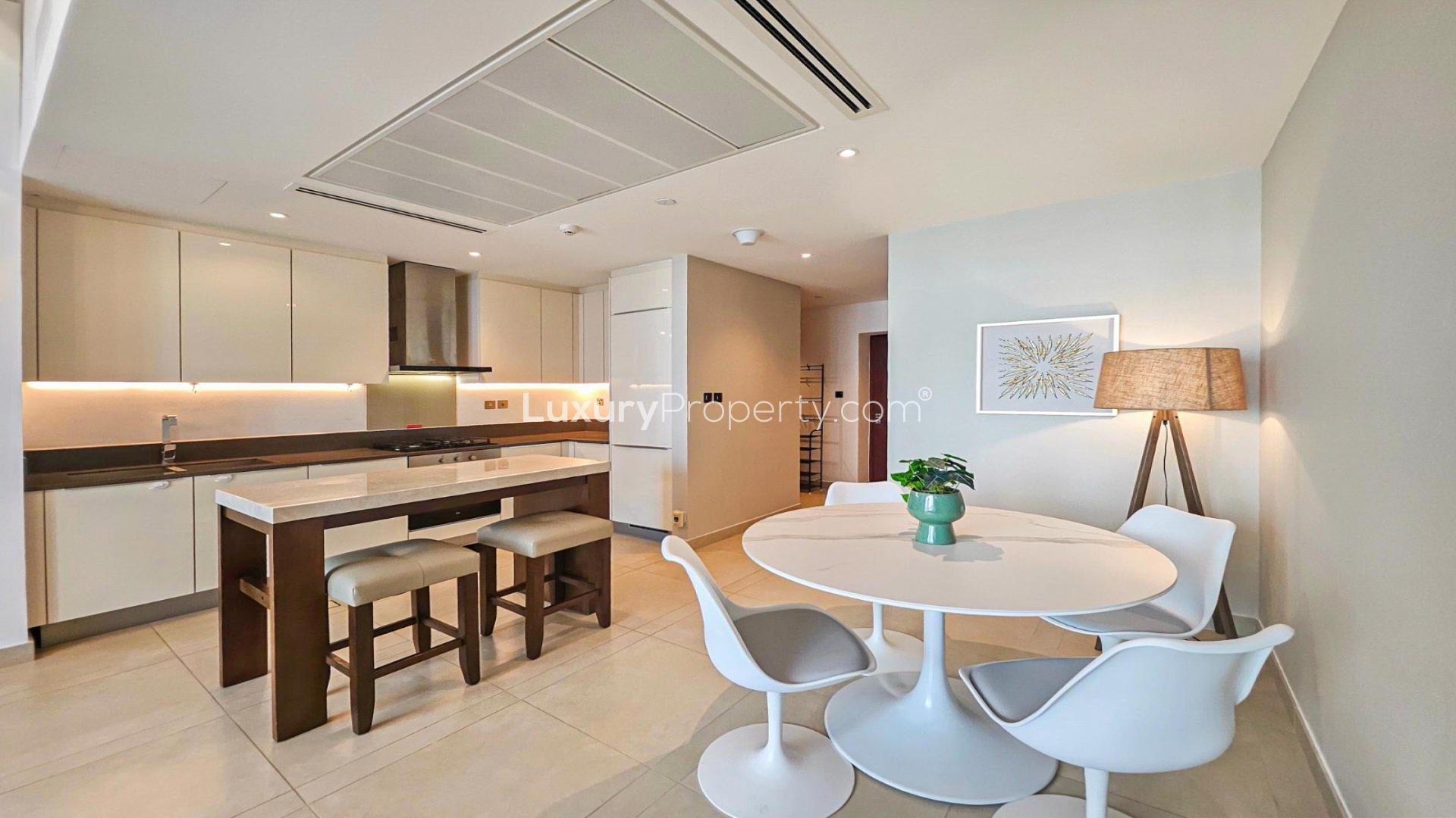 Modern bedroom in Dubai Marina apartment, featuring city views and elegant decor