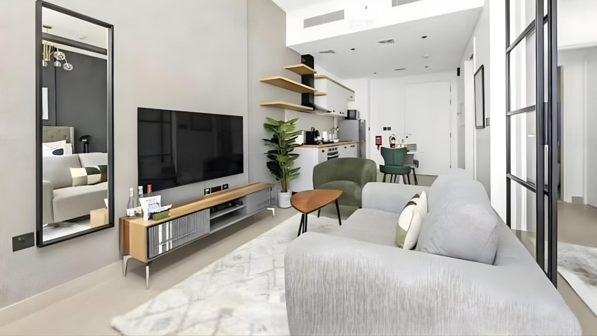 Fully furnished kitchen and dining area in 1-bedroom apartment, Collective Tower 1, Dubai Hills Estate