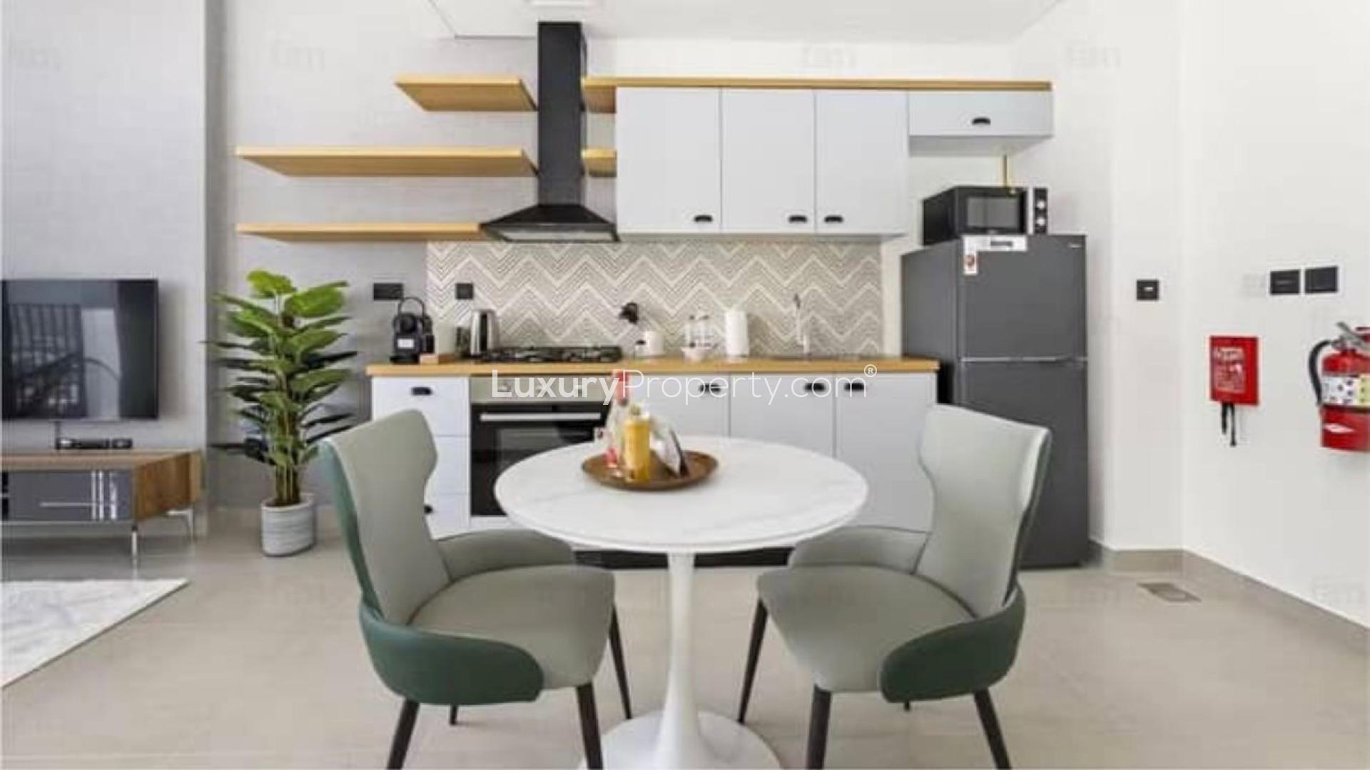 Modern bedroom in Collective Tower 1 apartment, Dubai Hills Estate, with city view