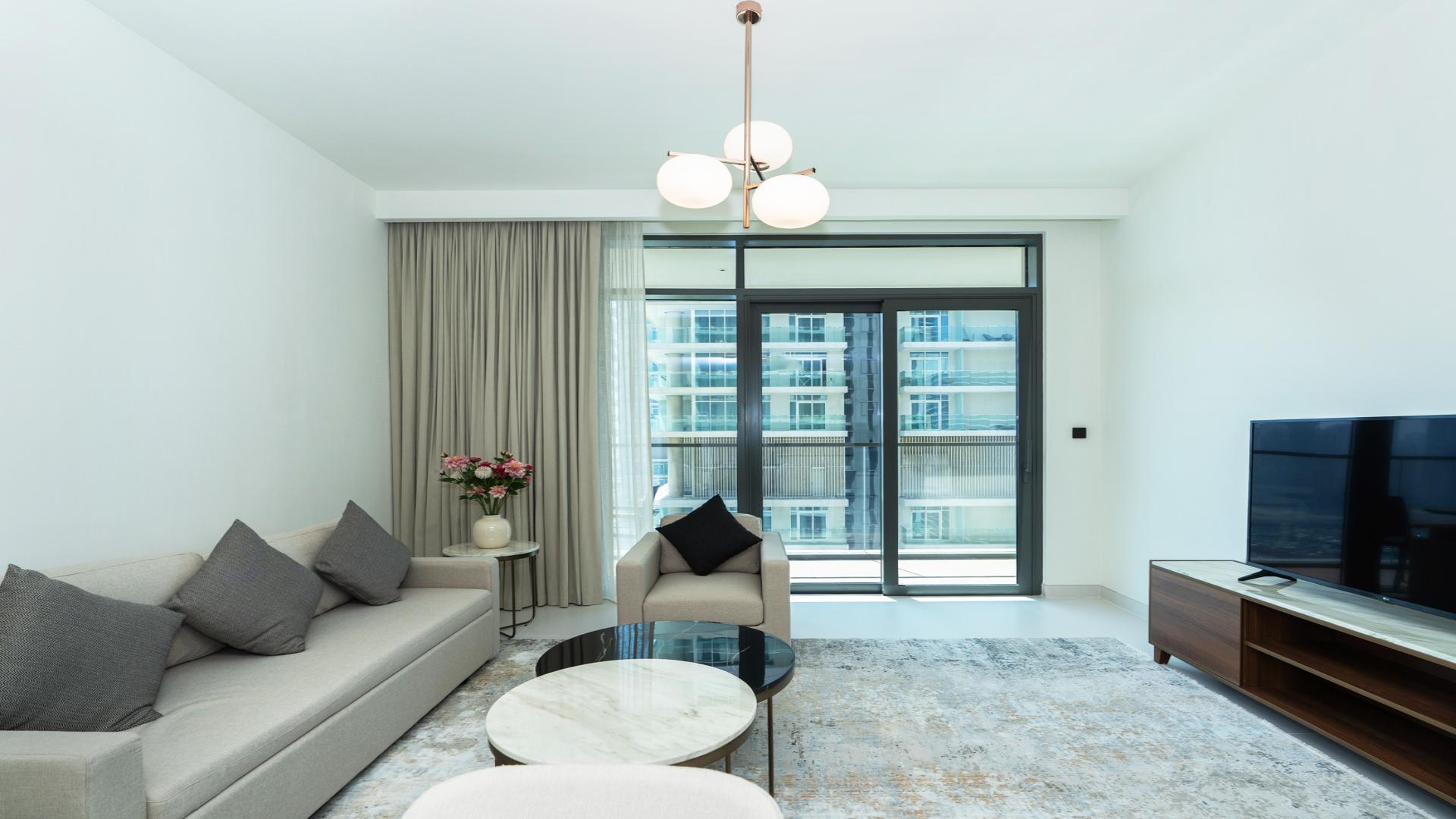 "Balcony view from 1-bedroom apartment at Marina Vista Tower 1, Dubai Harbour skyline.",Modern 1-bedroom apartment interior at Marina Vista Tower 1, Dubai Harbour, for rent