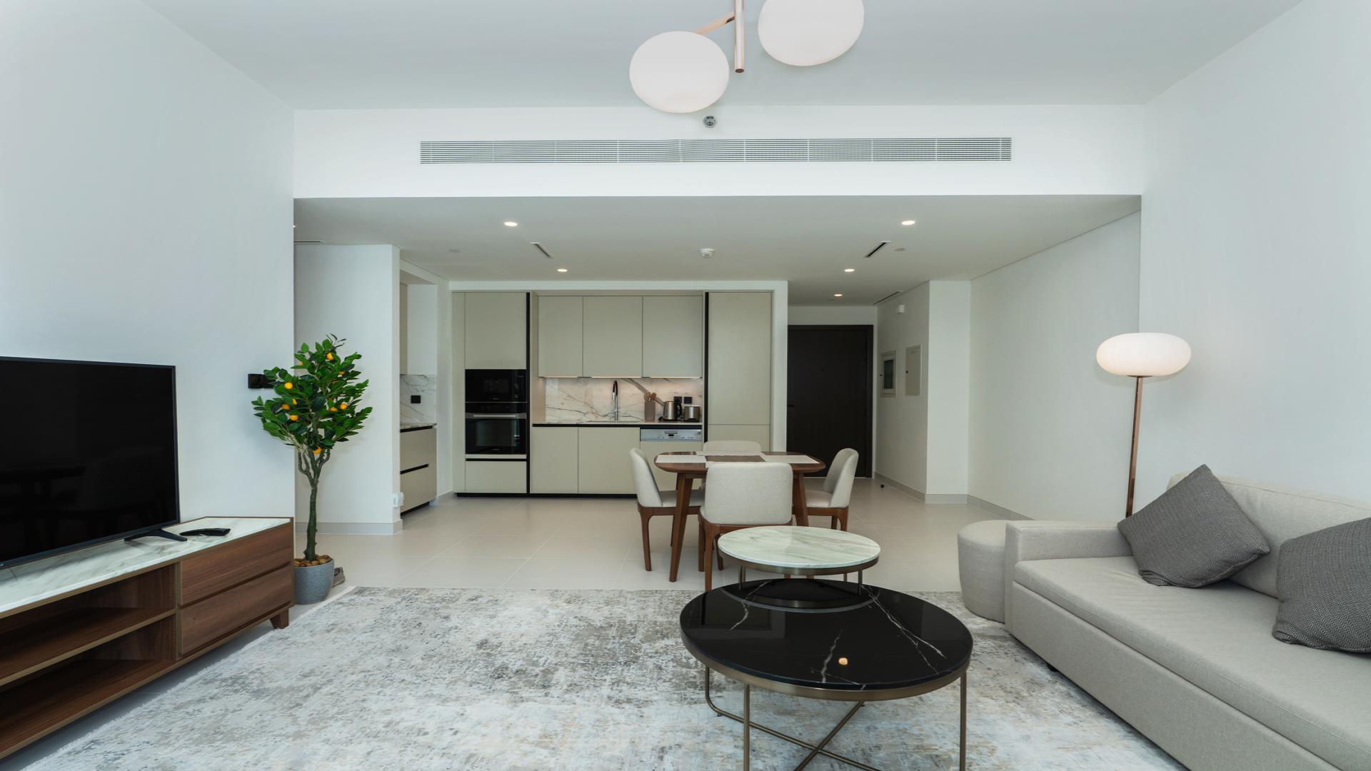 N/A,Modern living room in 1-bedroom apartment, Marina Vista Tower 1, Dubai Harbour