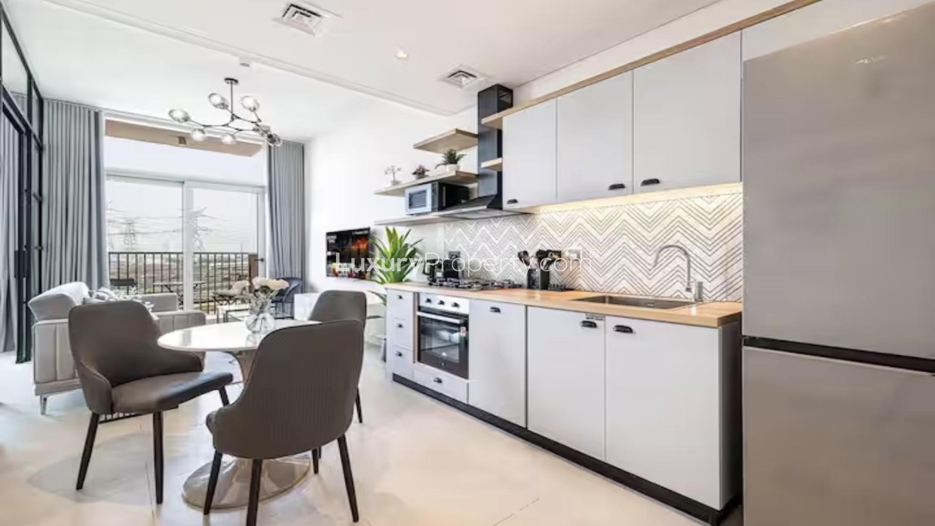 Modern living room in Dubai Hills Estate apartment with balcony view, Collective 2.0 Tower B