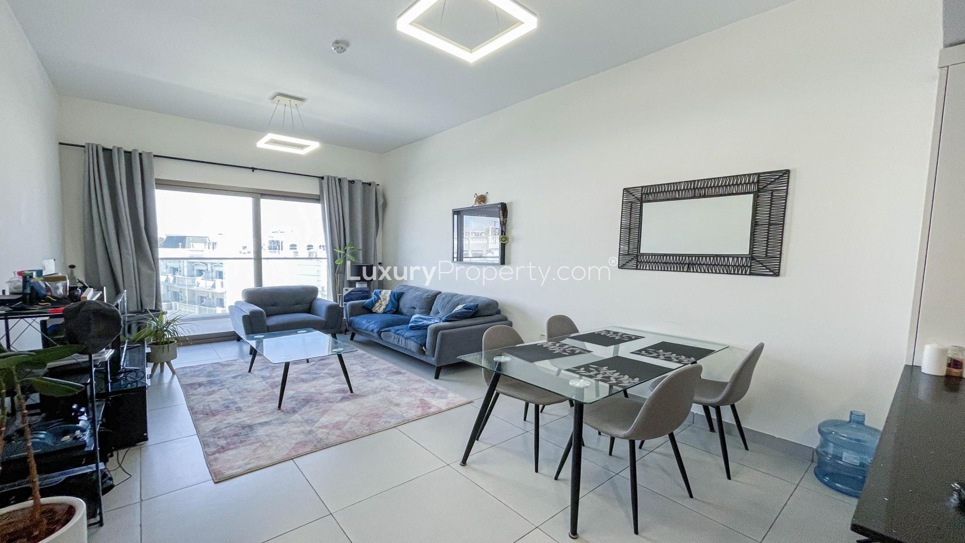 Balcony view from The Wings C apartment in Arjan, showcasing community and skyline