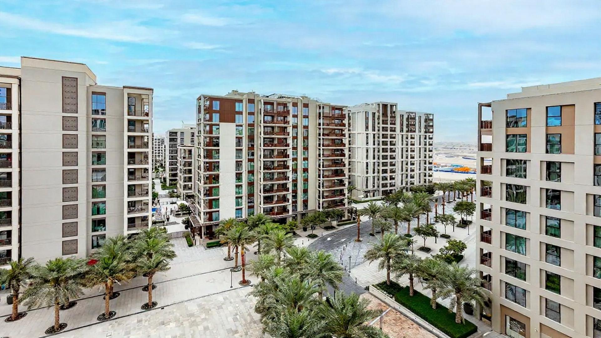 Modern one-bedroom apartment living area in Vida Creek Harbour, Creek Beach, available for rent