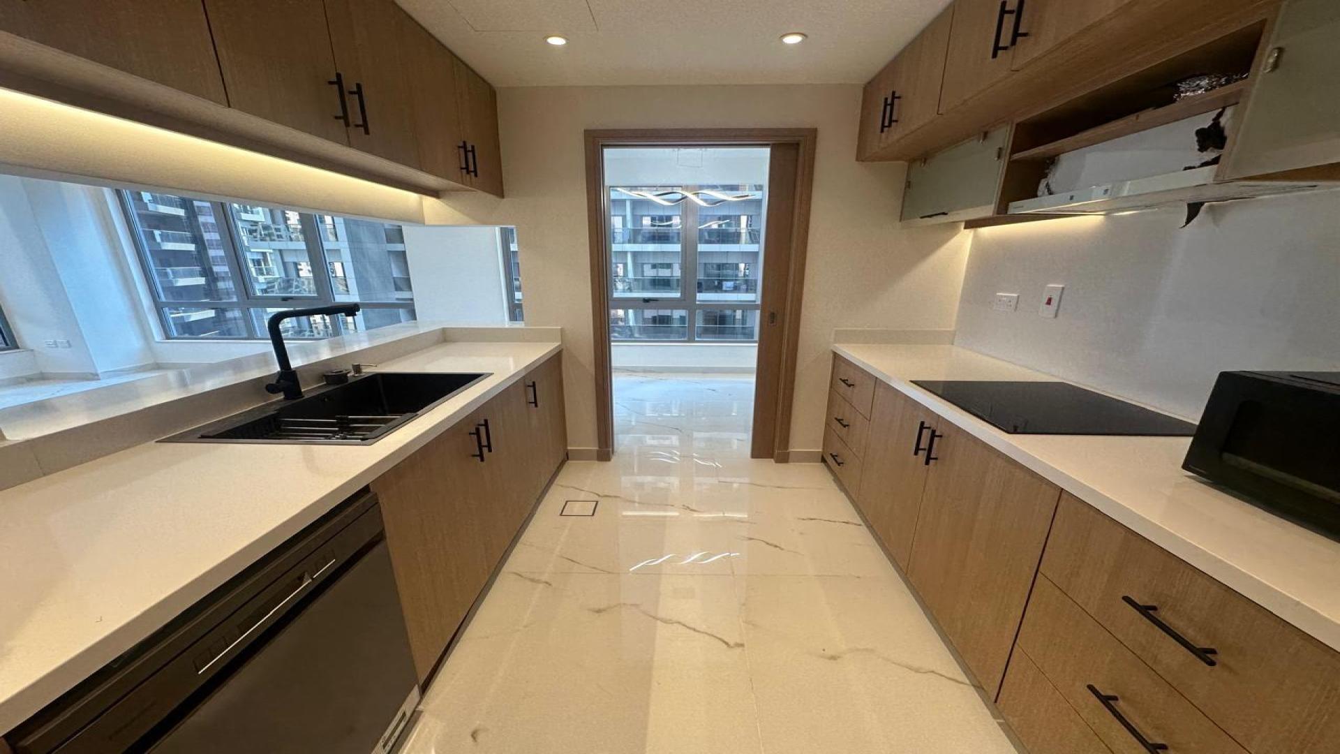 Mid-floor South Ridge 1 apartment with large windows and marble flooring in Downtown Dubai