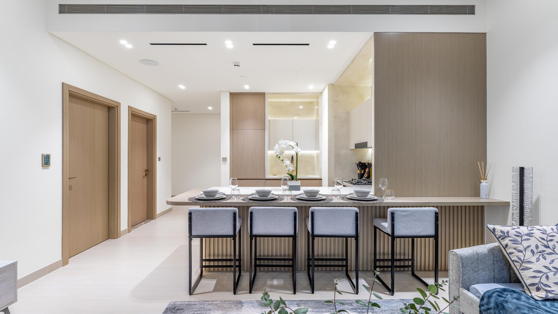 Modern furnished living area in Binghatti Royale apartment, JVC. Cozy seating and decor