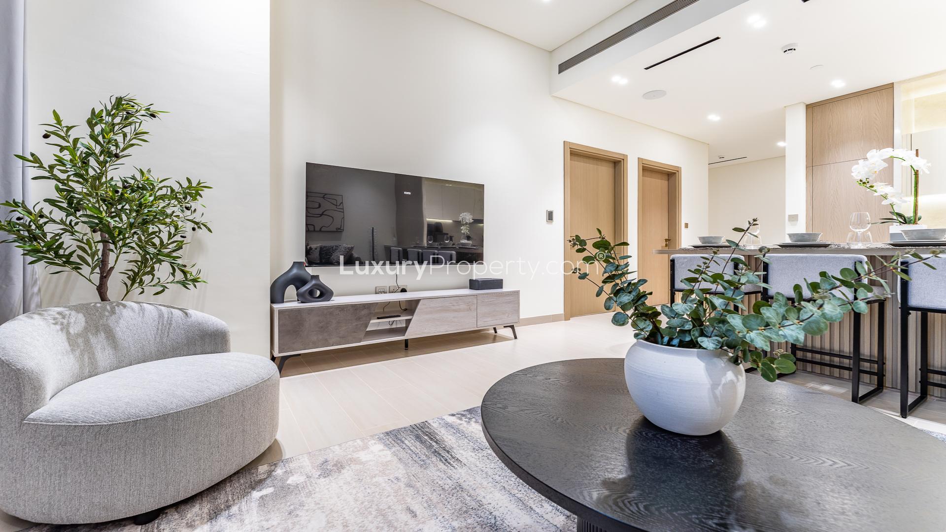 Fully furnished 1BR apartment interior with modern decor in Binghatti Royale, JVC