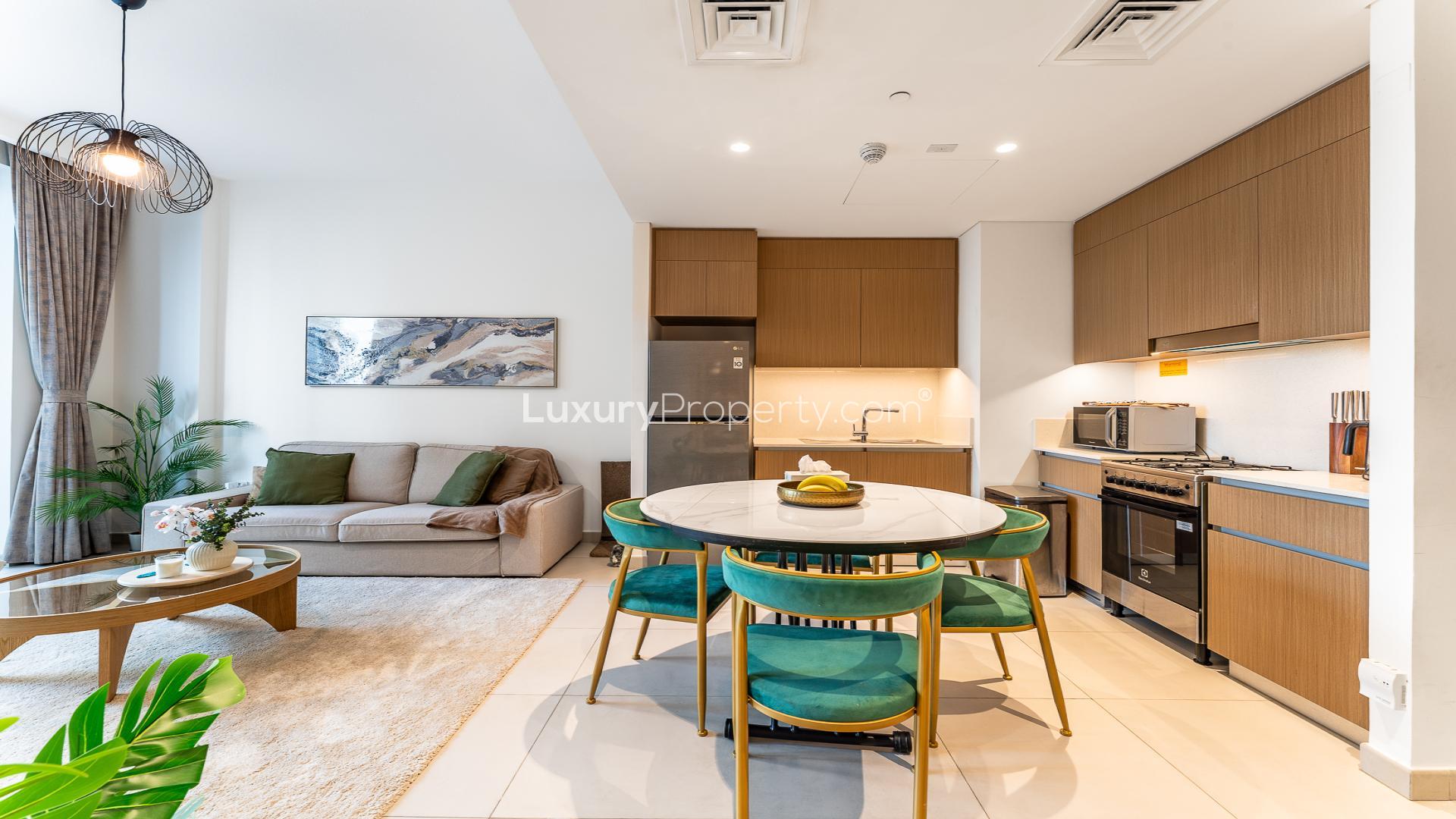 Modern living room and kitchen in upgraded 1-bedroom apartment, Bayshore, Dubai Creek Beach