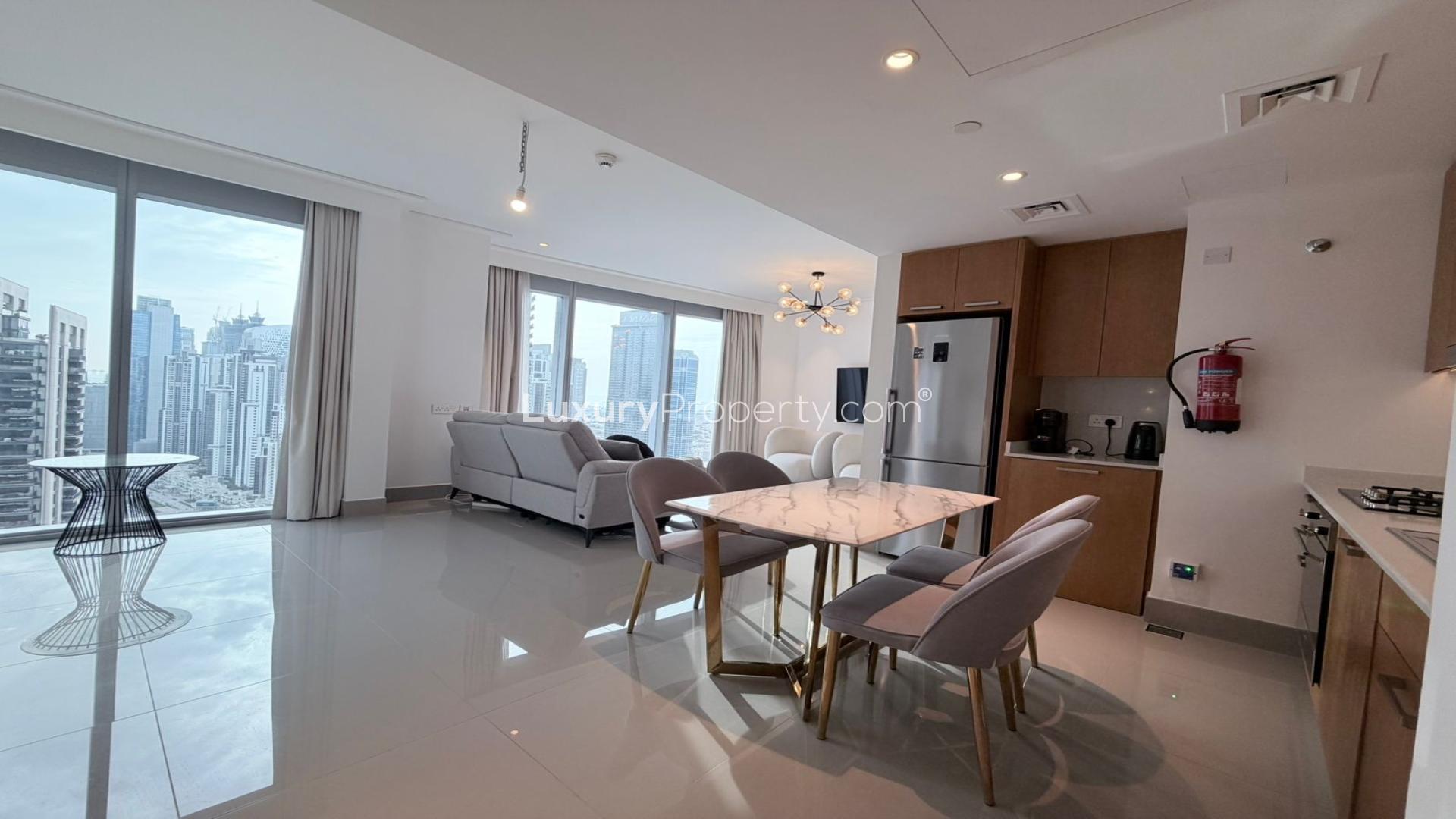 Modern living room in Downtown Dubai apartment with city view, stylish decor, and large windows