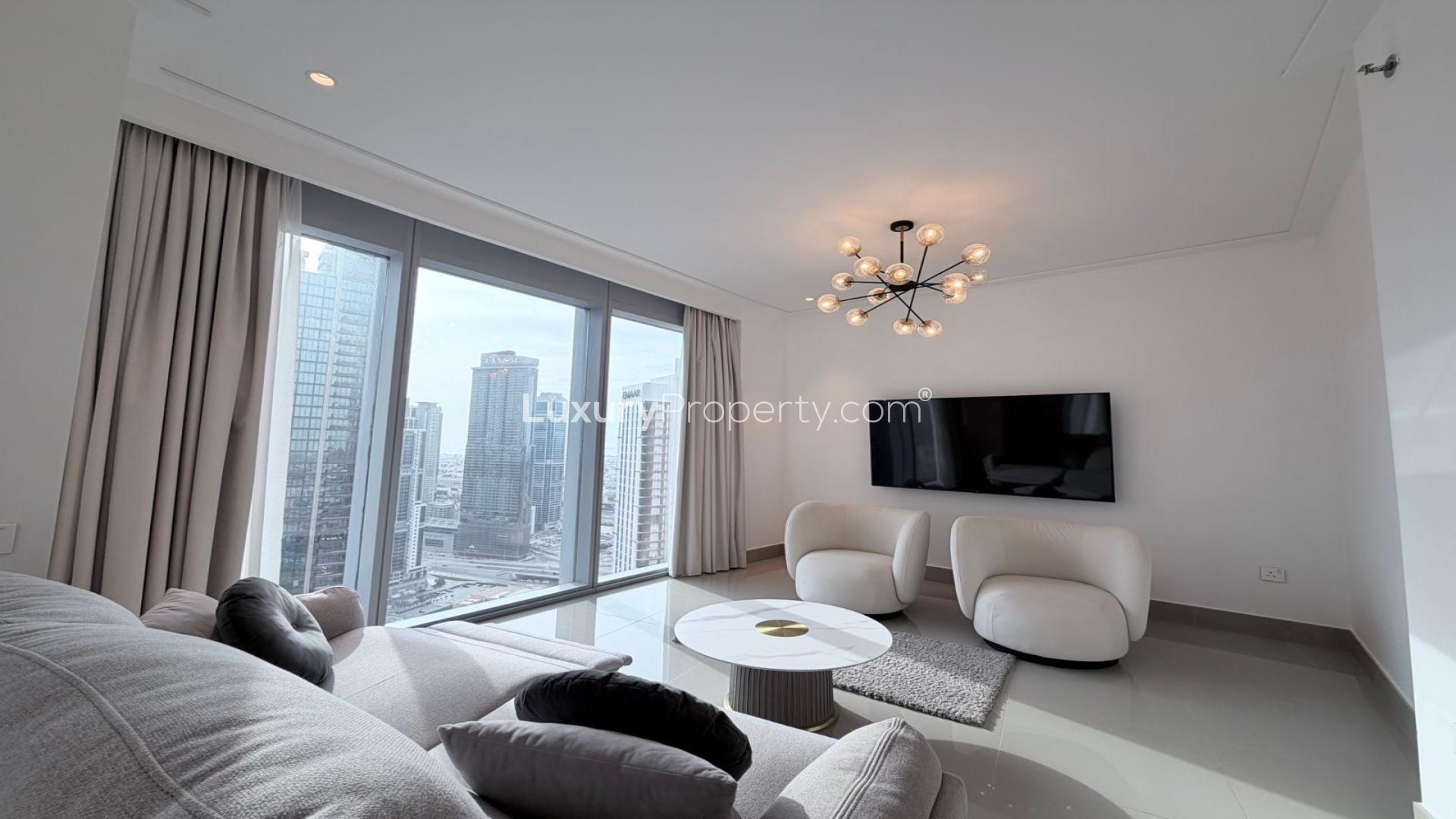 Modern one-bedroom apartment living room with city view in Opera District, Downtown Dubai
