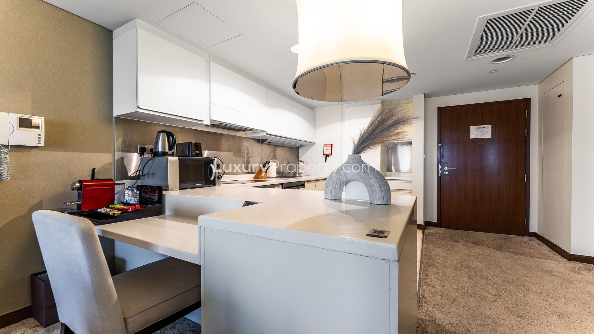 High-floor apartment living room with modern decor at The Dubai Mall Residences