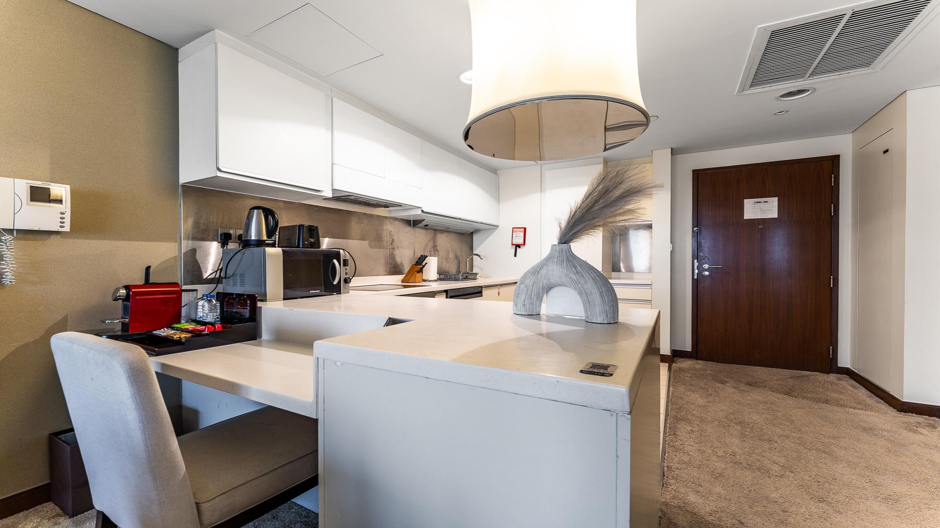 High-floor apartment living room with modern decor at The Dubai Mall Residences