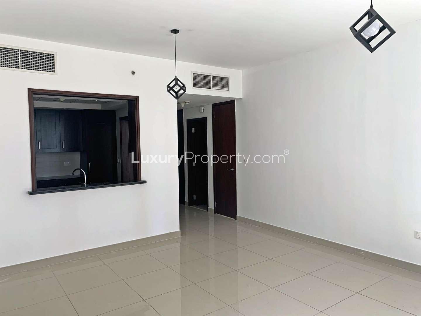 Bright living room in one-bedroom apartment, 29 Burj Boulevard, Downtown Dubai