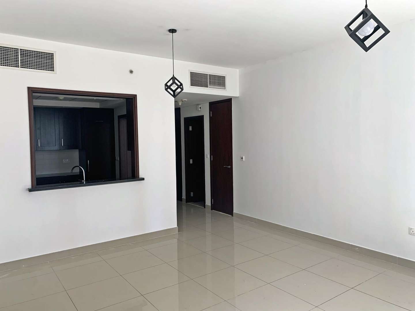 Bright living room in one-bedroom apartment, 29 Burj Boulevard, Downtown Dubai