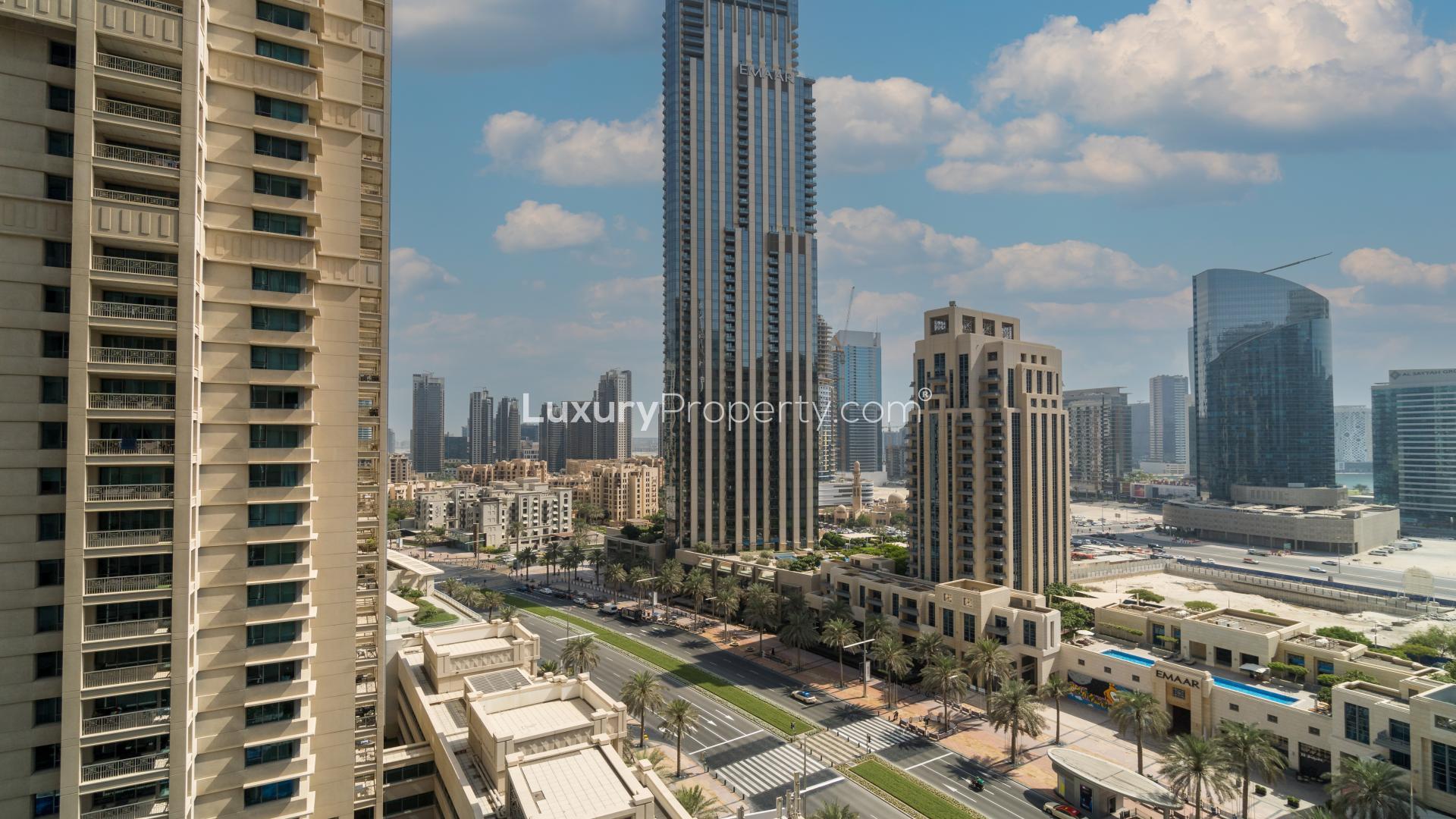 Mid-floor apartment interior with open kitchen in 29 Burj Boulevard, Downtown Dubai