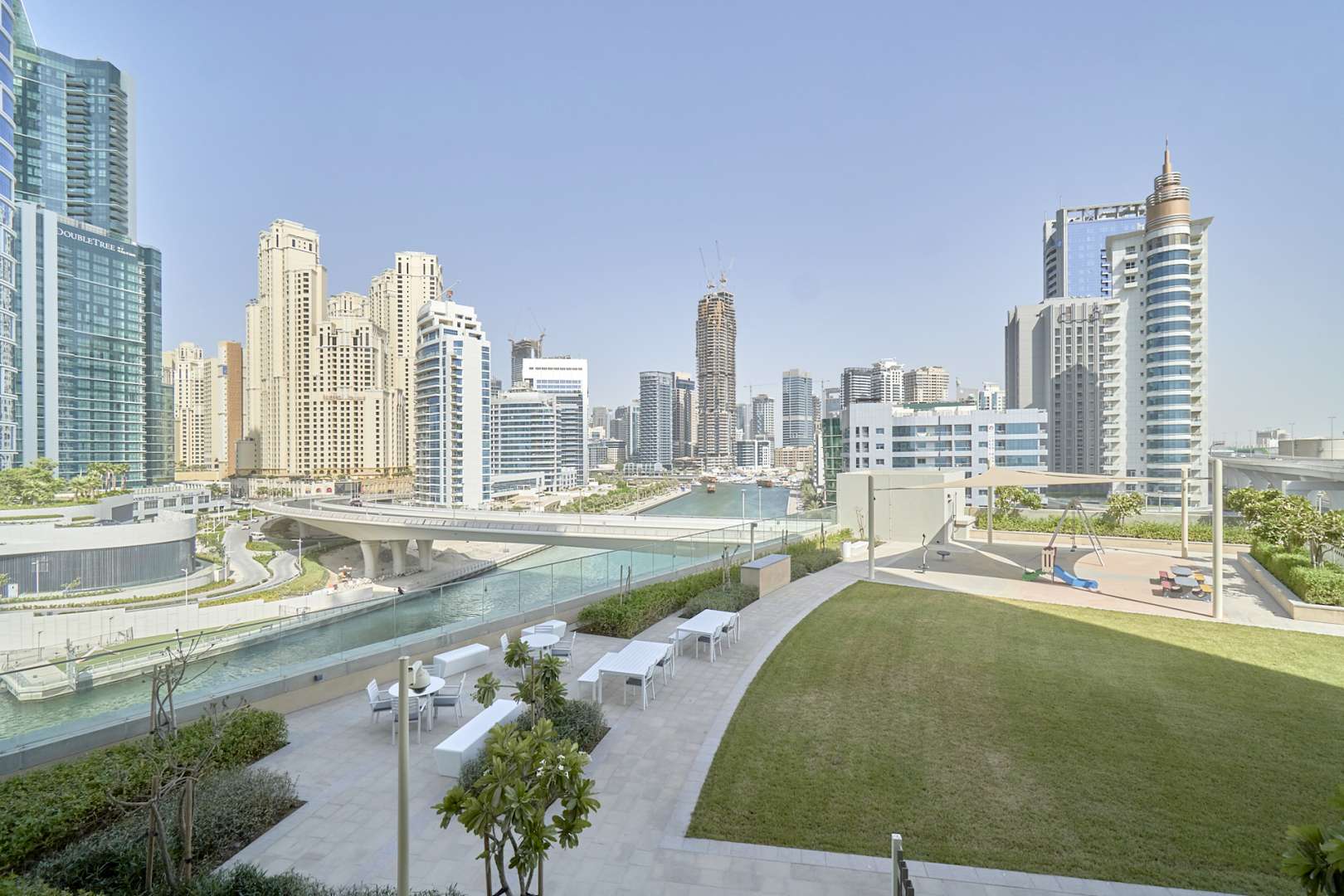 Rooftop garden view of Dubai Marina skyline from 5242 apartment for rent