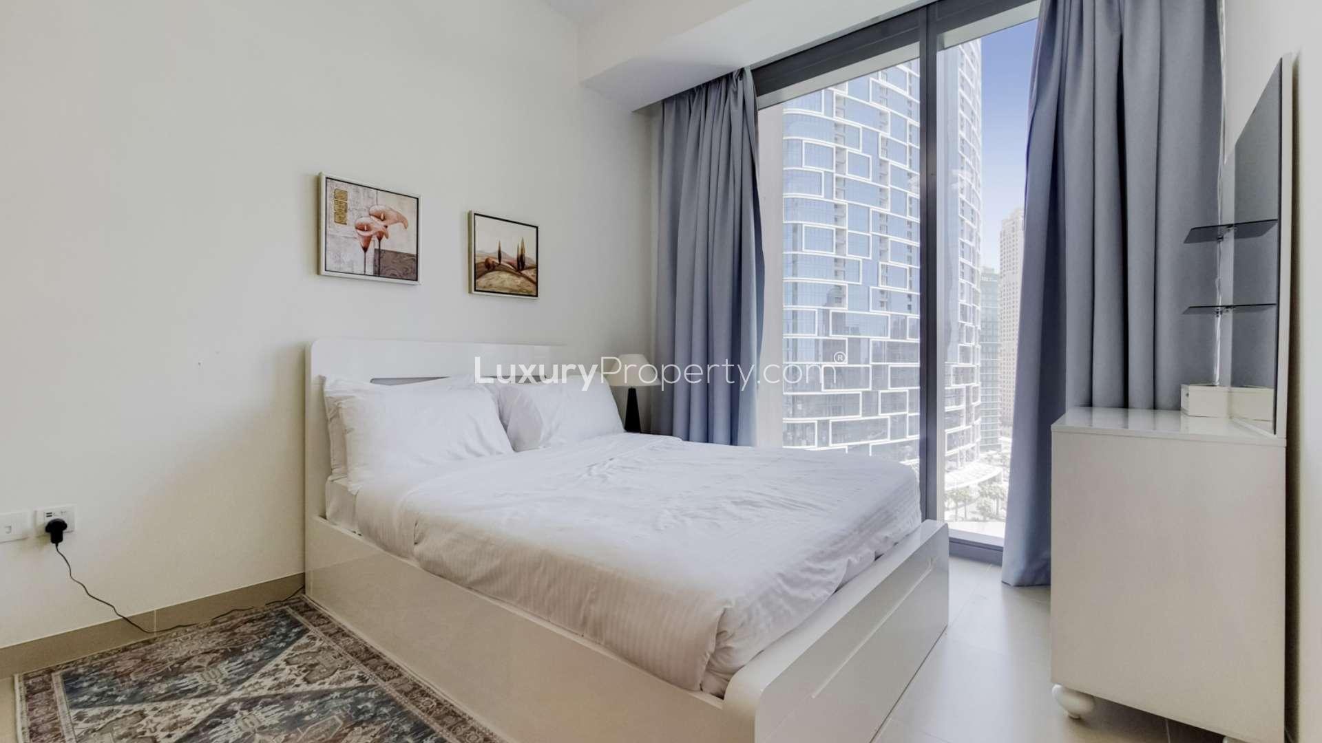 Brand new apartment bedroom with large window, Dubai Marina view, modern decor, Ref LP15894