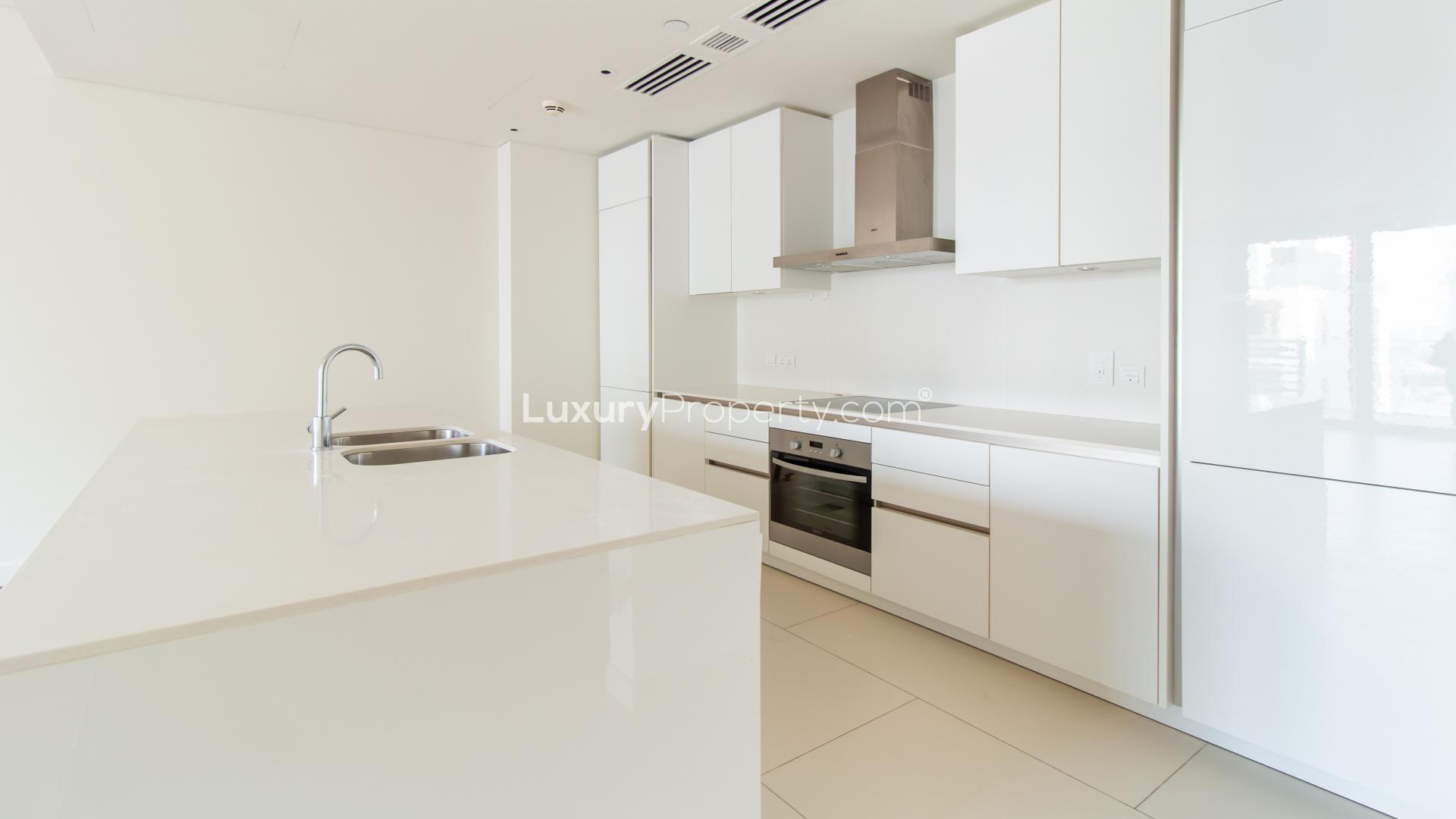 Modern open-plan kitchen and living area in 1-bedroom apartment, City Walk, Dubai for rent