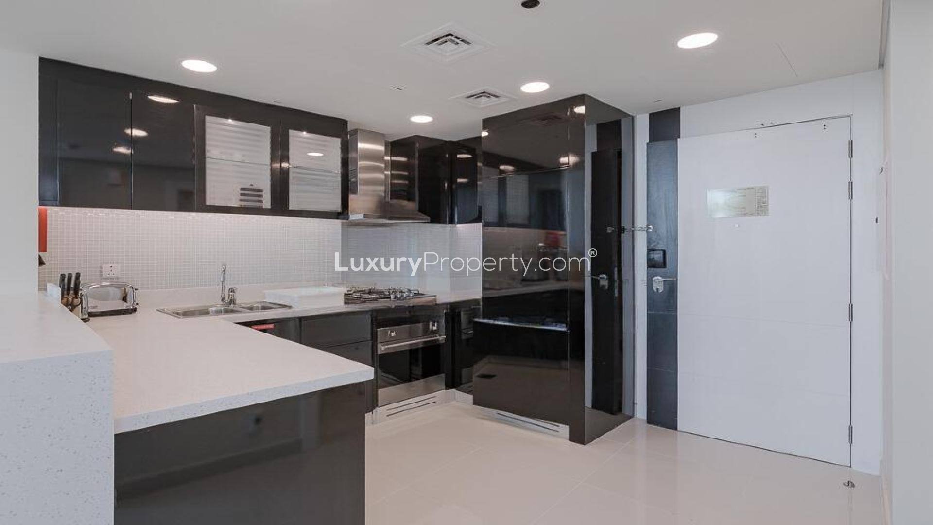 Modern living room in Bays Edge apartment, Business Bay, featuring stylish furniture and decor