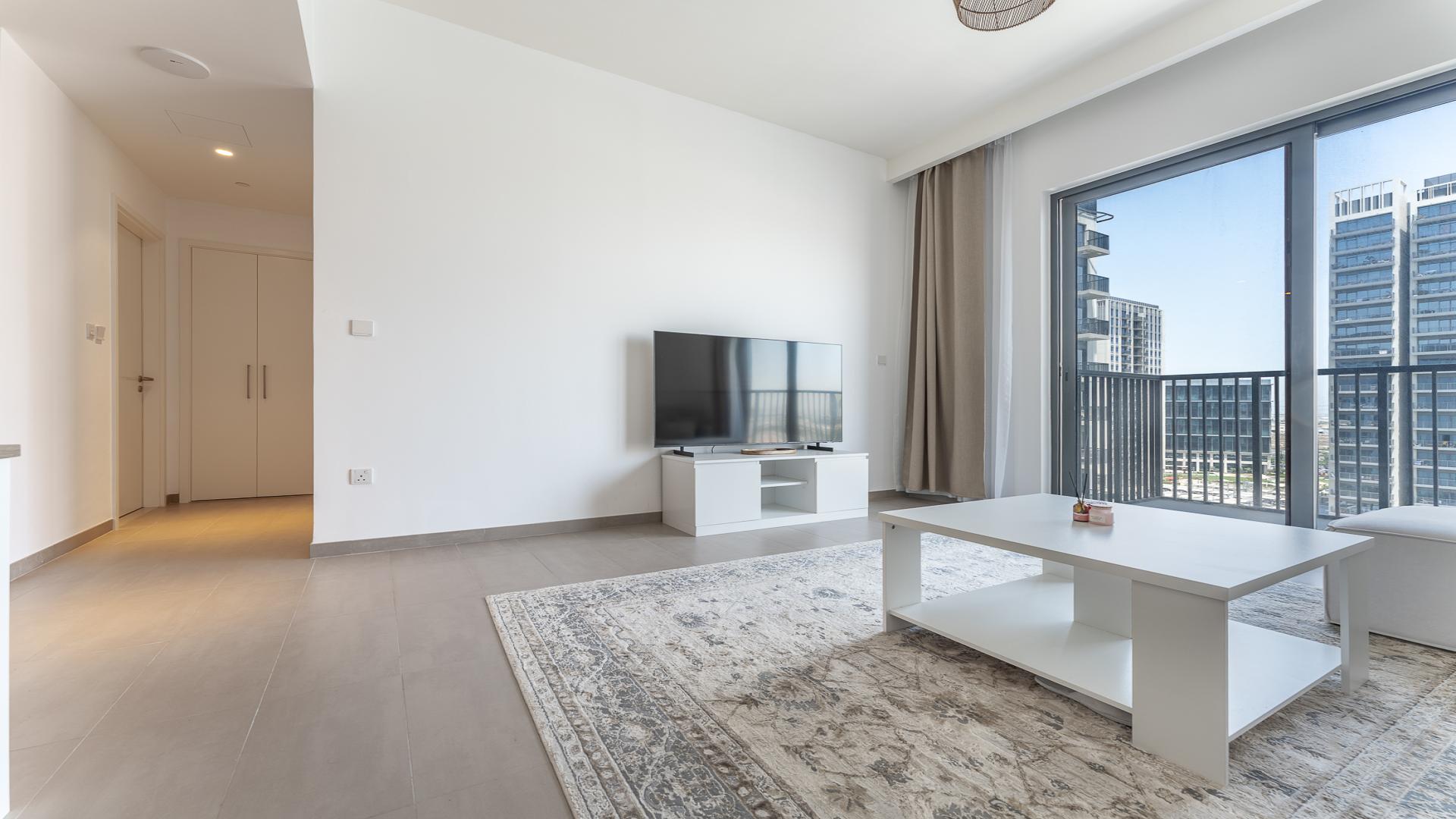 Modern apartment buildings in Park Ridge, Dubai Hills Estate, with park access and city views