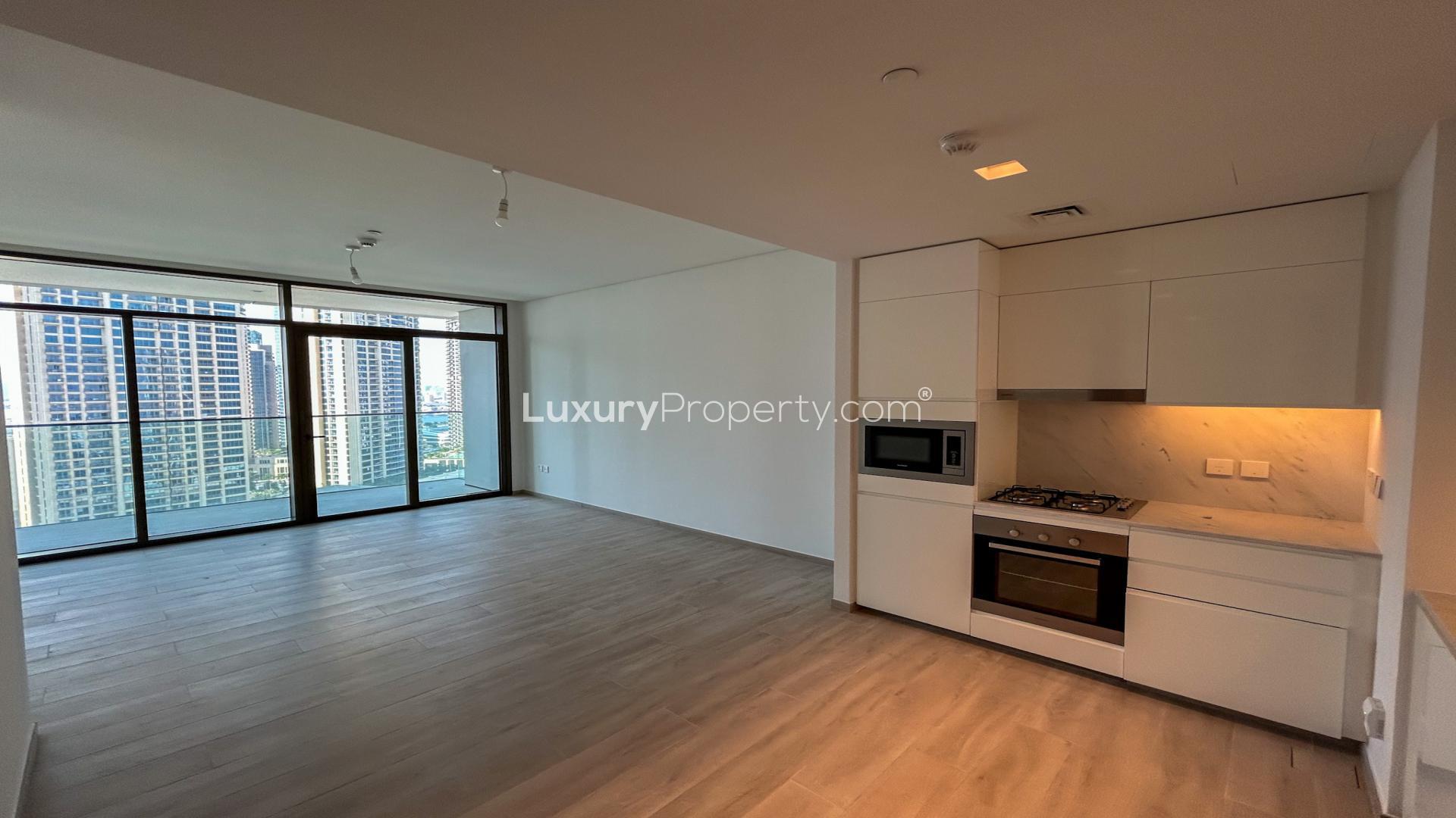 "Balcony view from luxury apartment in Dubai Creek Harbour, Palace Residences for rent.",Brand new luxury apartment interior with modern kitchen in Dubai Creek Harbour