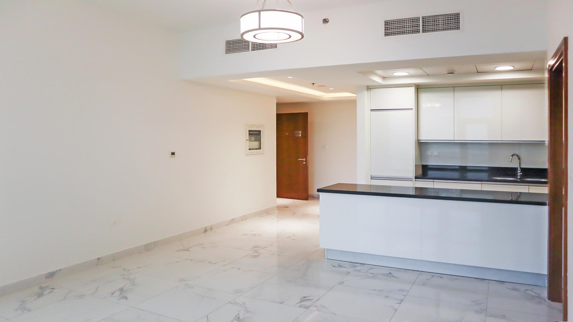 N/A,Modern kitchen and living area in 1-bedroom apartment, Al Habtoor City, Business Bay