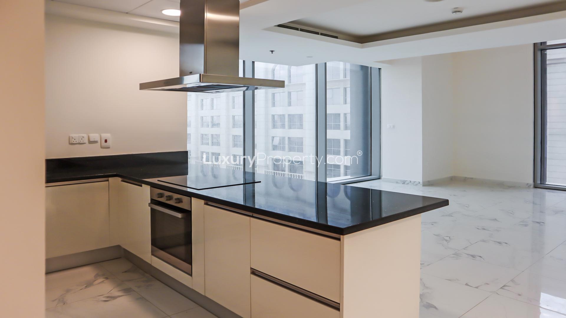 Stylish open-plan kitchen in 1-bedroom loft, Al Habtoor City, Business Bay apartment for rent