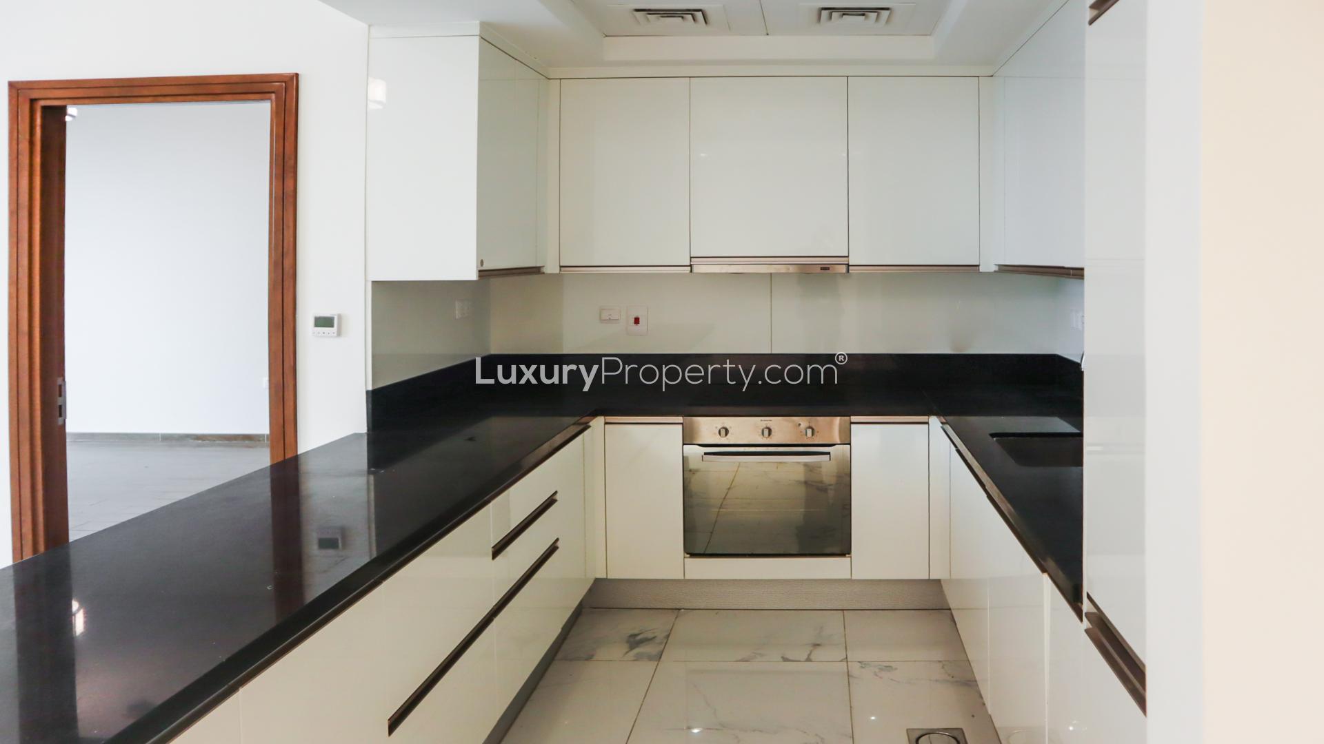 Bright living area with large windows in Al Habtoor City apartment, Business Bay