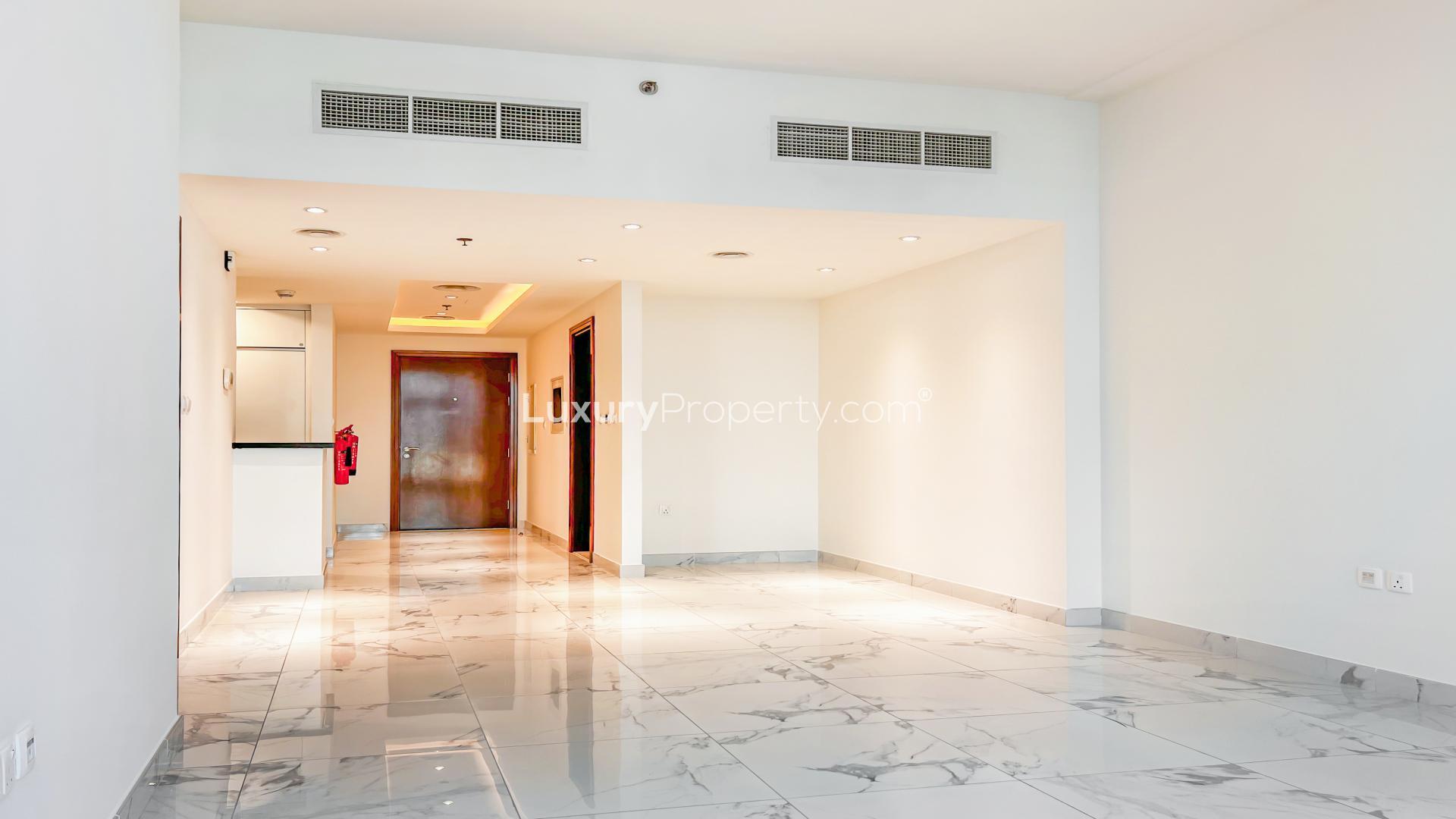 High-end apartment interior with marble floors, open kitchen in Al Habtoor City, Business Bay