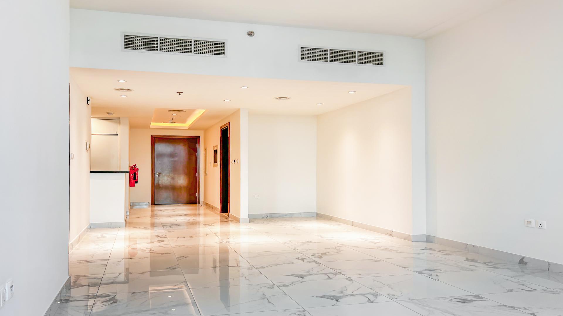High-end apartment interior with marble floors, open kitchen in Al Habtoor City, Business Bay