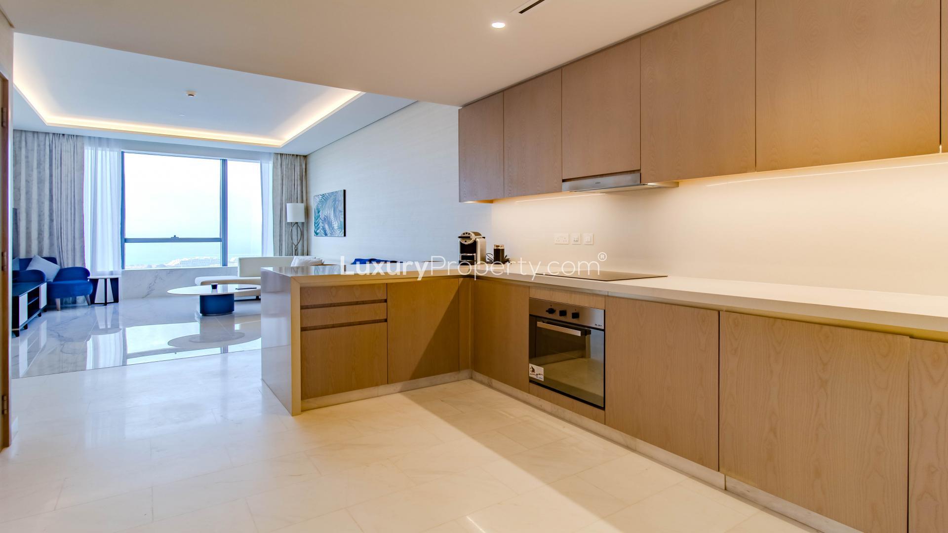 Upgraded Palm Jumeirah apartment bedroom with panoramic sea view, modern decor, natural light