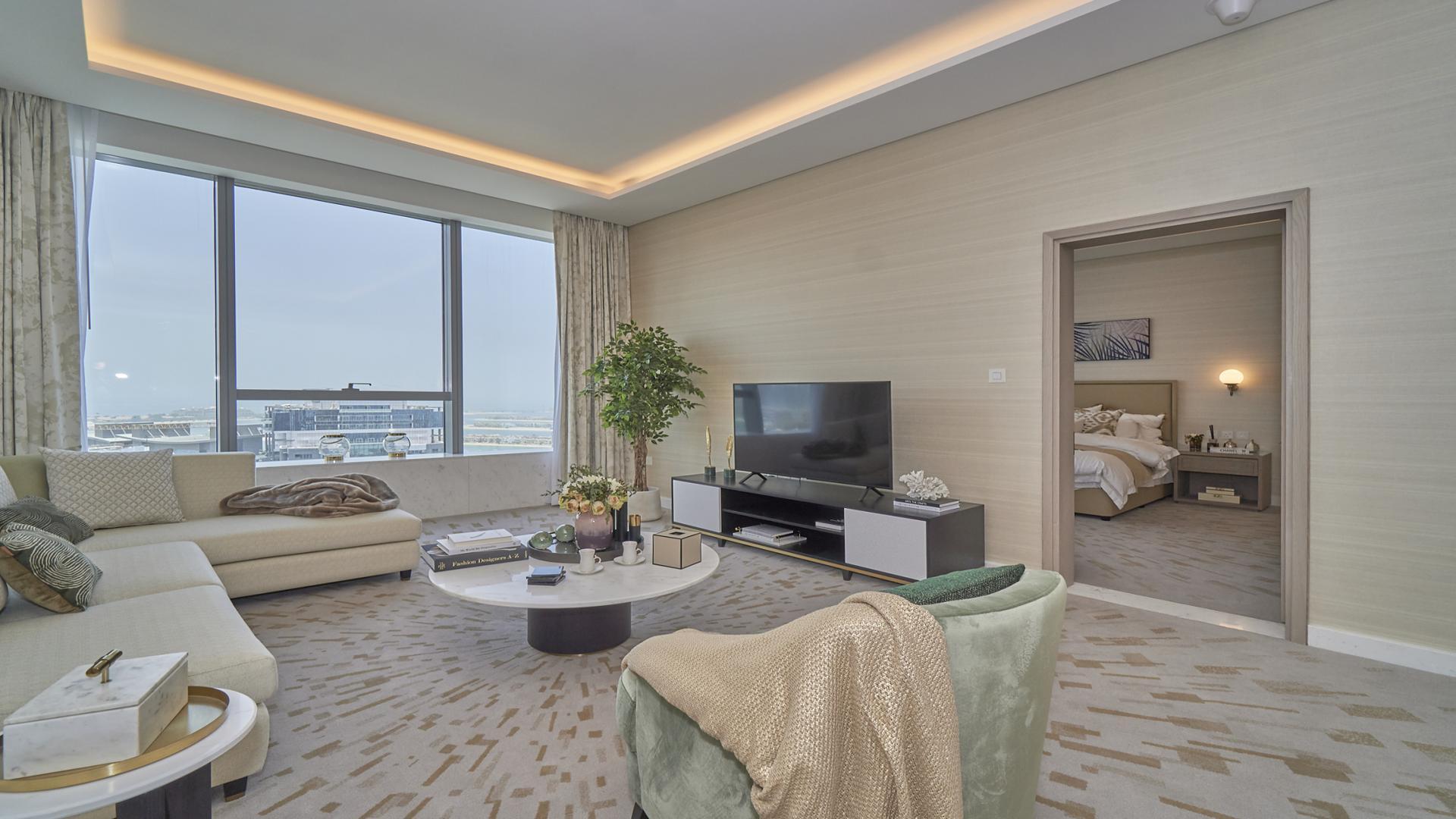 High-floor Palm Jumeirah apartment living room with Burj Al Arab view, luxury decor