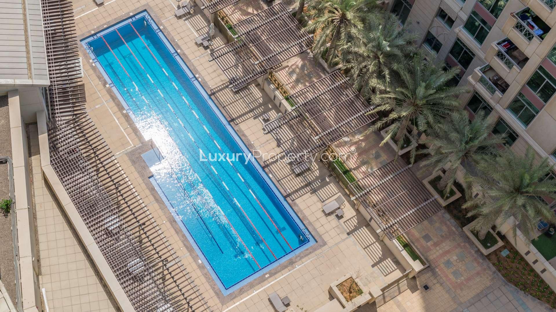 Modern kitchen with marble countertops in Al Murjan Tower apartment, Dubai Marina