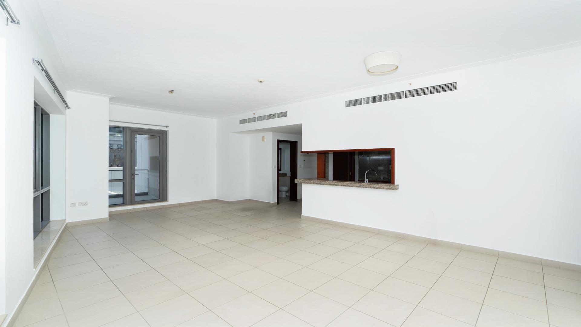 Spacious living area in 1-bedroom apartment, South Ridge, Downtown Dubai, with large windows